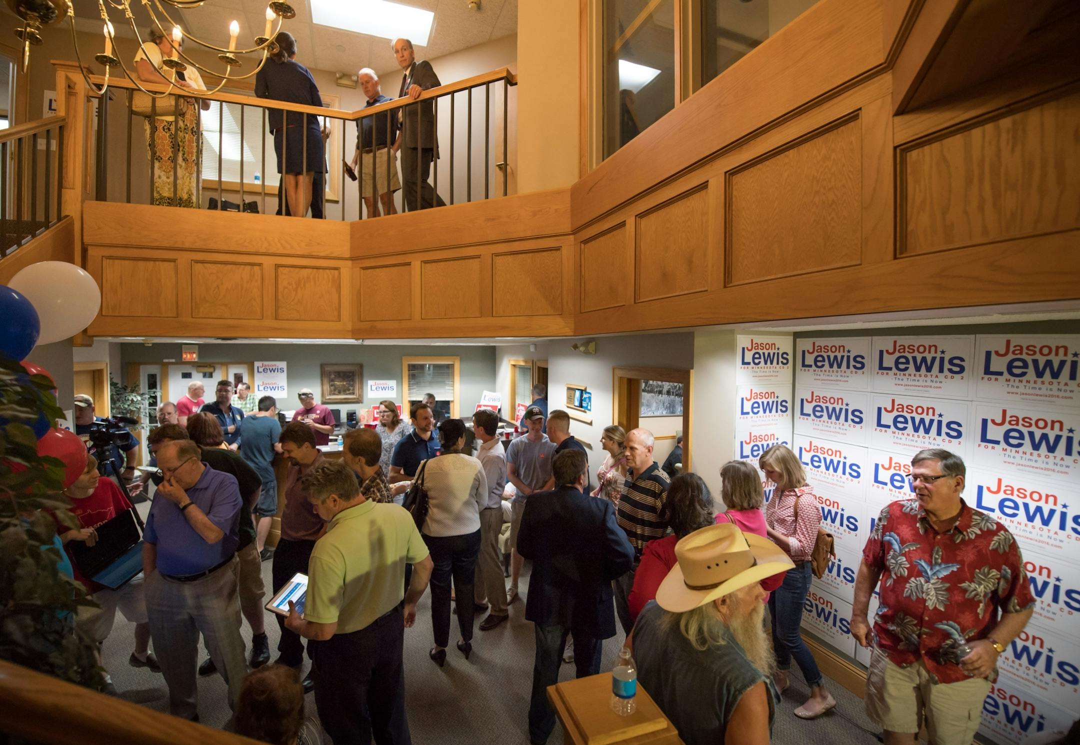 Jason Lewis supporters waited as as early poll results were posted in his Burnsville campaign headquarters just after the polls closed. He is running against three other Republicans for John Kline's Congressional seat in the second congressional district. The winner of this primary will run against Democrat Angie Craig.