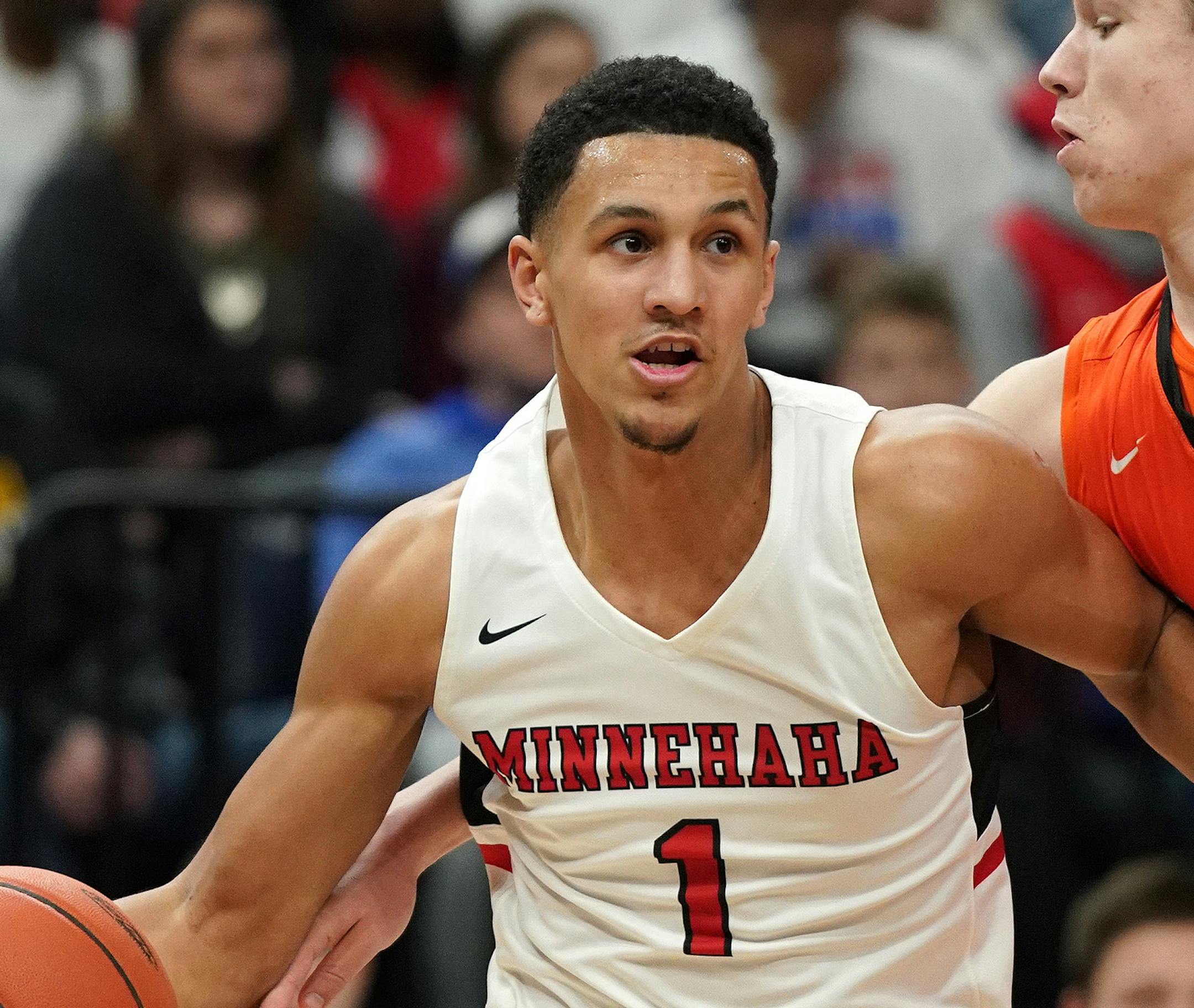 Minnehaha guard Jalen Suggs (1) drove to the basket as Lake City guard Justin Wohlers (14) tried to swat the ball away in the second half. ] ANTHONY SOUFFLE • anthony.souffle@startribune.com Minnehaha Academy played Lake City High School in an MSHSL Class 2A boys' semifinal basketball game Friday, March 22, 2019 at the Target Center in Minneapolis.