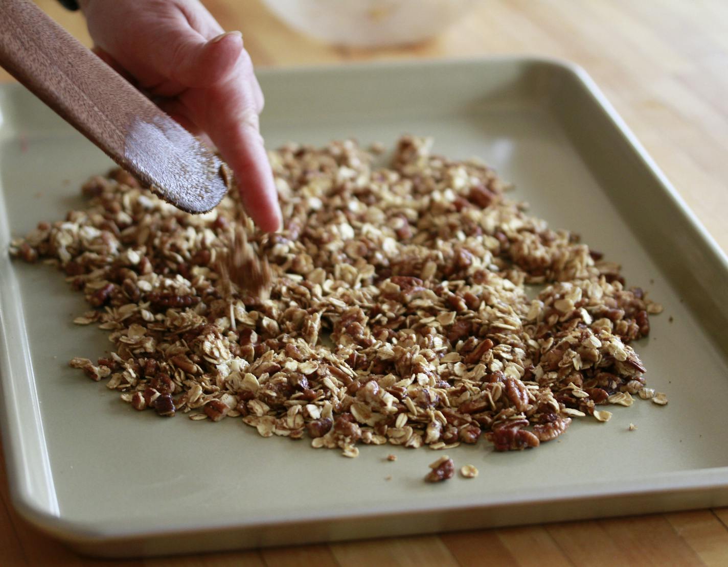 Baking Central - Lemon Lush -nuts and oat flakes go on a cookie sheet to bake ] Tom Sweenet, March 18, 2015, Edina, MN