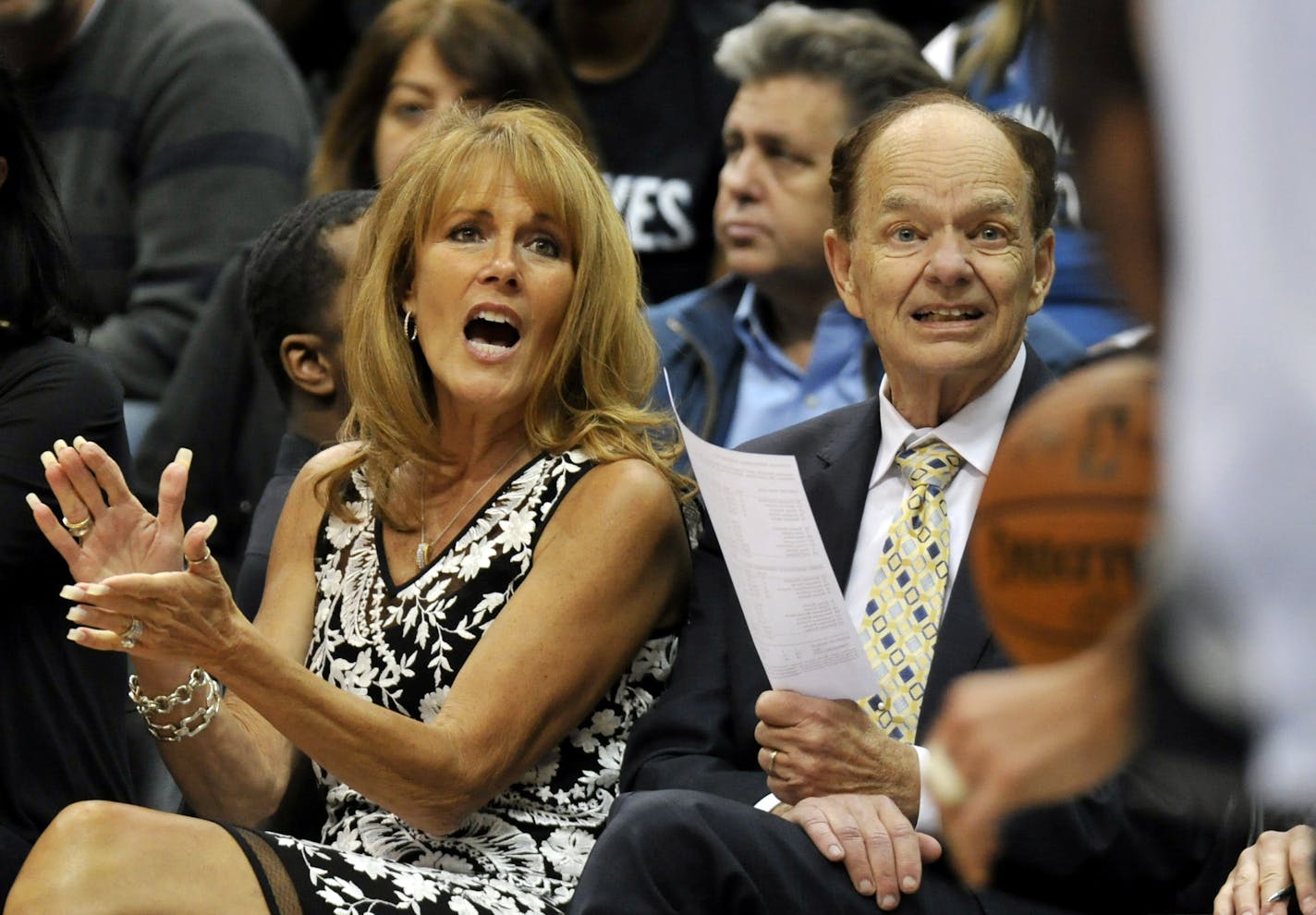 Minnesota Timberwolves' owner Glen Taylor, right, and wife, Becky, watch during the second quarter of an NBA basketball game against the Utah Jazz on Saturday, March 26, 2016, in Minneapolis. (AP Photo/Hannah Foslien)