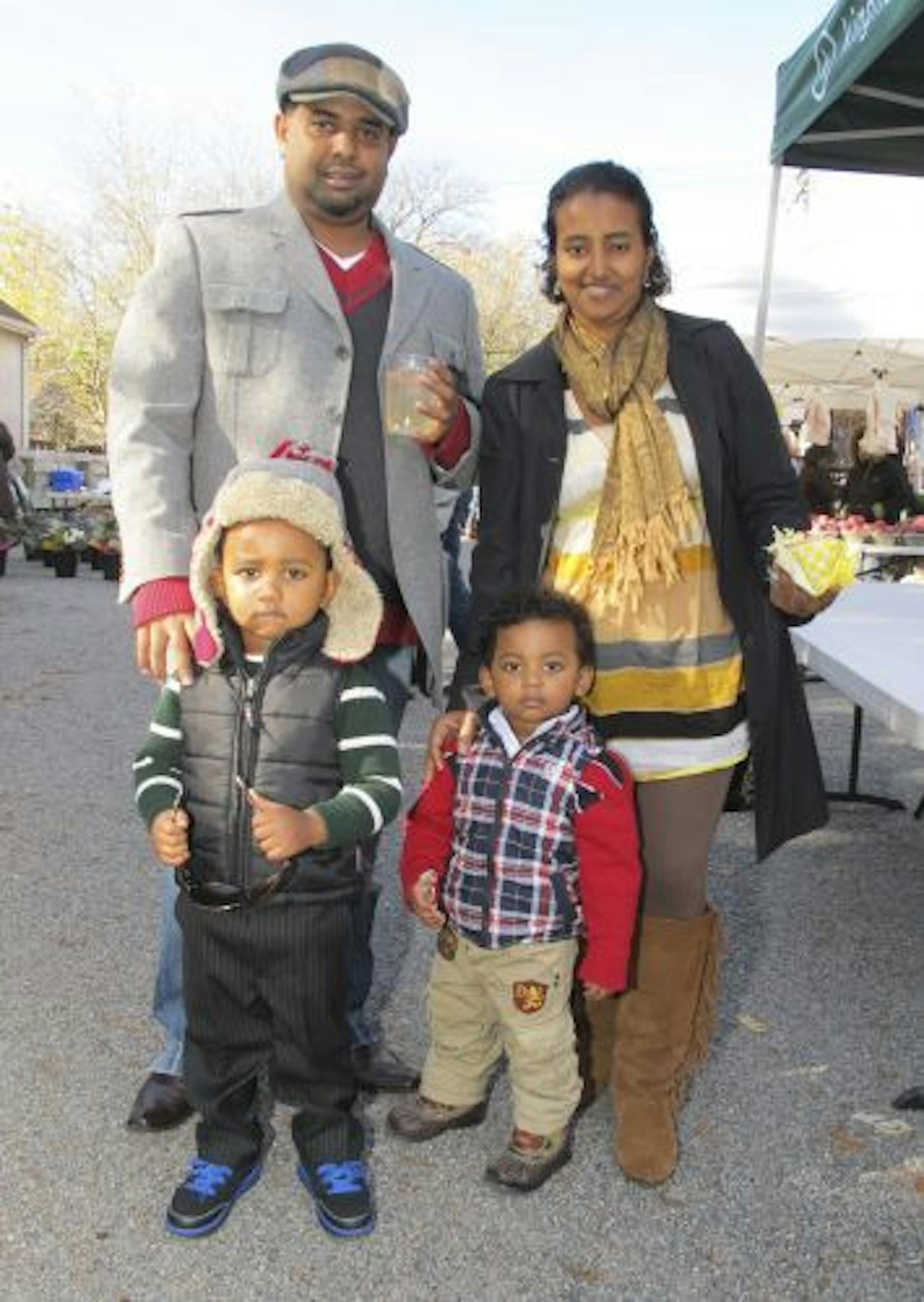 Abu Sheikh (top left) and Yumi Benti (top right) with Zack (lower left), age 3 and Riyadh (lower right), 2 Sheikh.