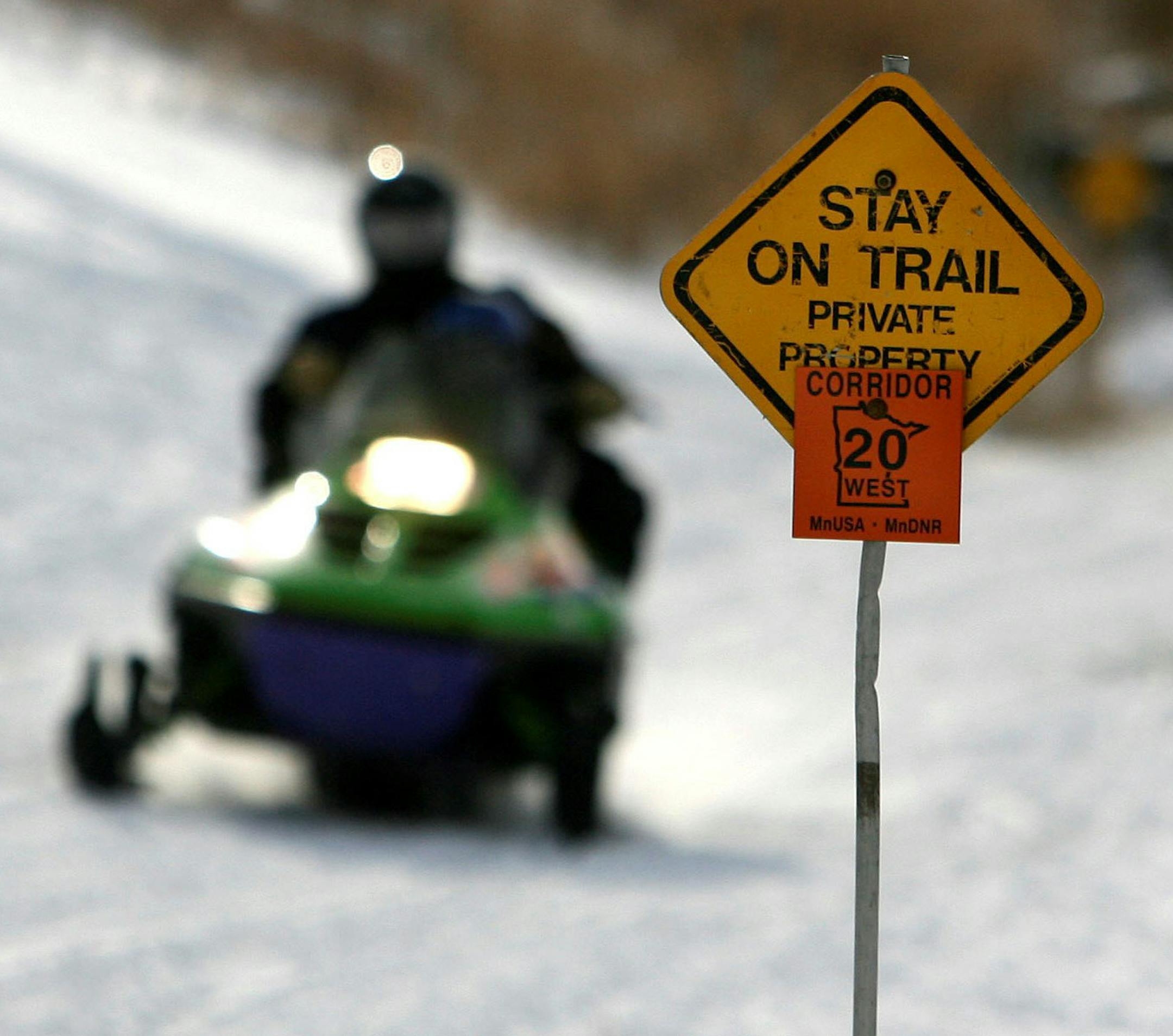 The early burst of snow has ushered in an early start to the snowmobile season, with riders preparing their vehicles and attacking the trails early, top. The high volume of riders has been a mixed blessing for the DNR, which is charged with monitoring compliance and enforcing speed, safety and anti-trespassing and noise regulations.