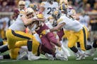 Minnesota running back Mohamed Ibrahim was stopped by the Iowa defense during the first quarter