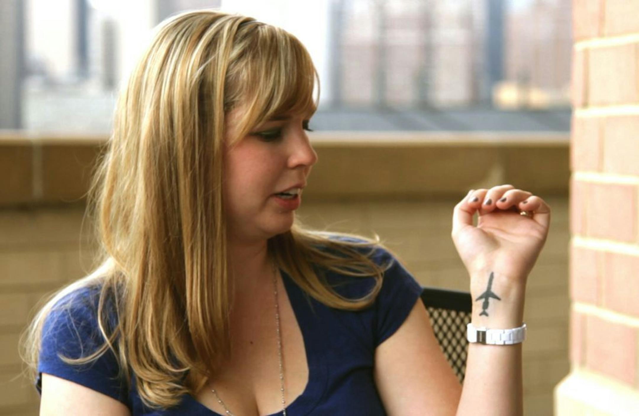 Cecelia Crocker, the lone survivor of a 1987 plane crash near Detroit Metropolitan Airport that killed 156 people, shows an airplane tattoo on her left wrist in a September 2011 photo provided by Sole Survivor Film. Crocker, then Cichan, was was 4 years old when Northwest Airlines Flight 255 crashed in Romulus, Mich. Crocker, now 30, breaks her silence in the new documentary, �Sole Survivor,� discussing how the crash of the Phoenix-bound jetliner has affected her. "I got this tattoo as a reminde