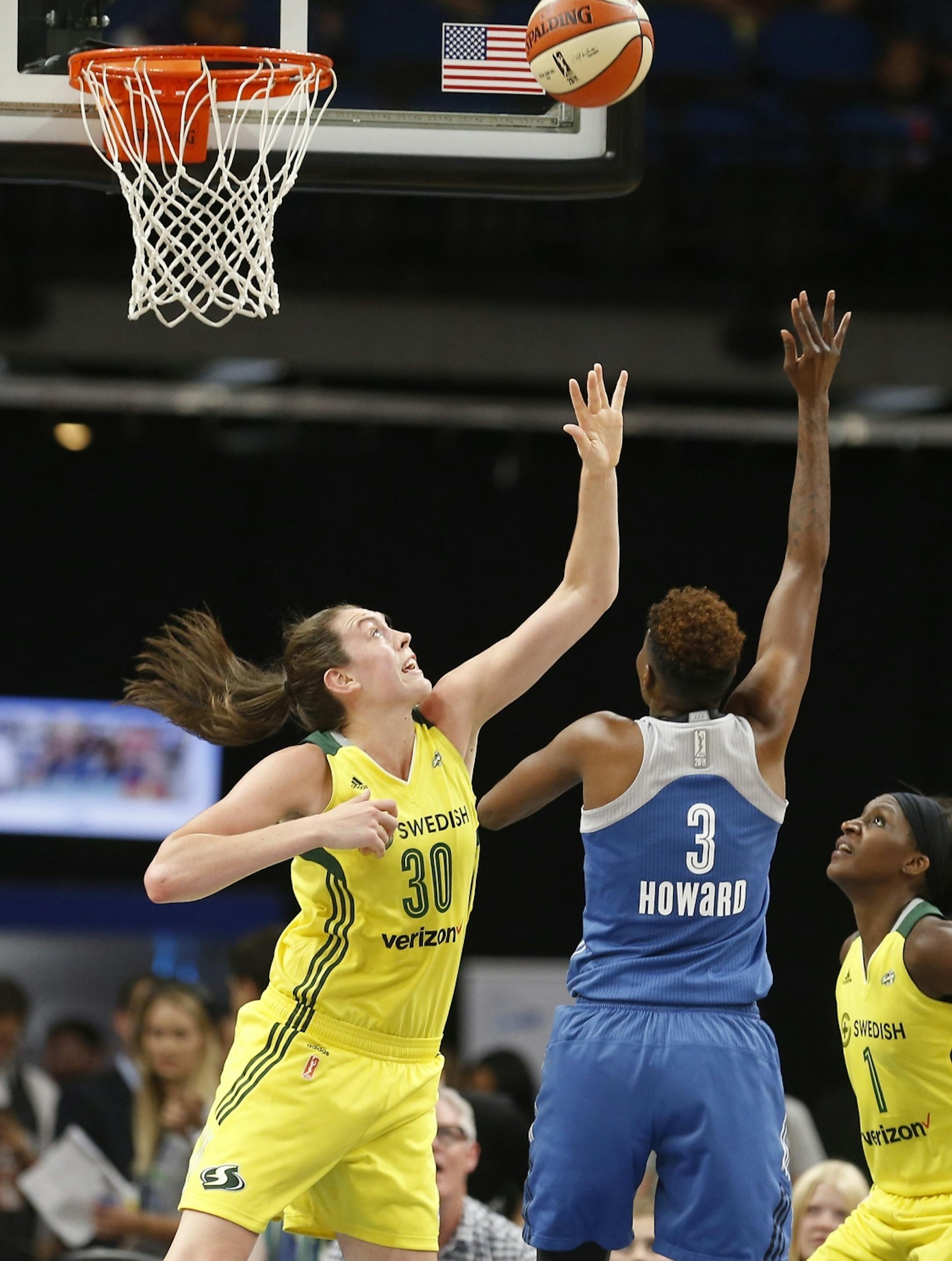 Minnesota Lynx forward Natasha Howard (3) shoots against Seattle Storm forward Breanna Stewart (30) during the first half.