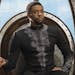 This image released by Disney shows Chadwick Boseman in a scene from Marvel Studios' "Black Panther." Just as "Black Panther" is setting records at th