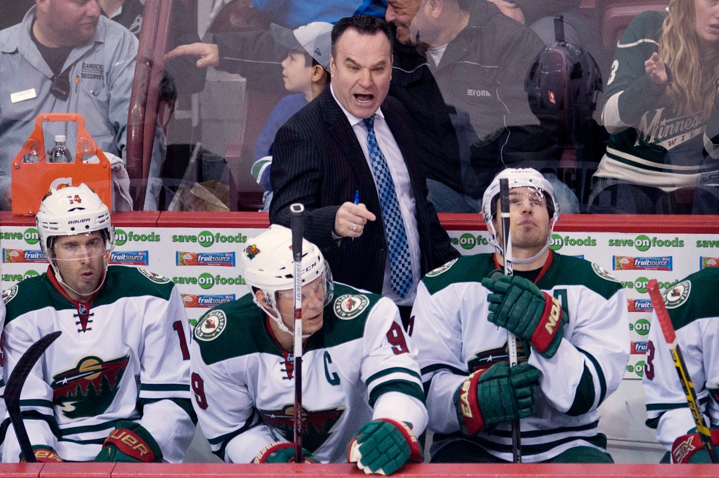 Wild interim coach John Torchetti shouted instructions to the players during the first period against the Canucks on Monday.