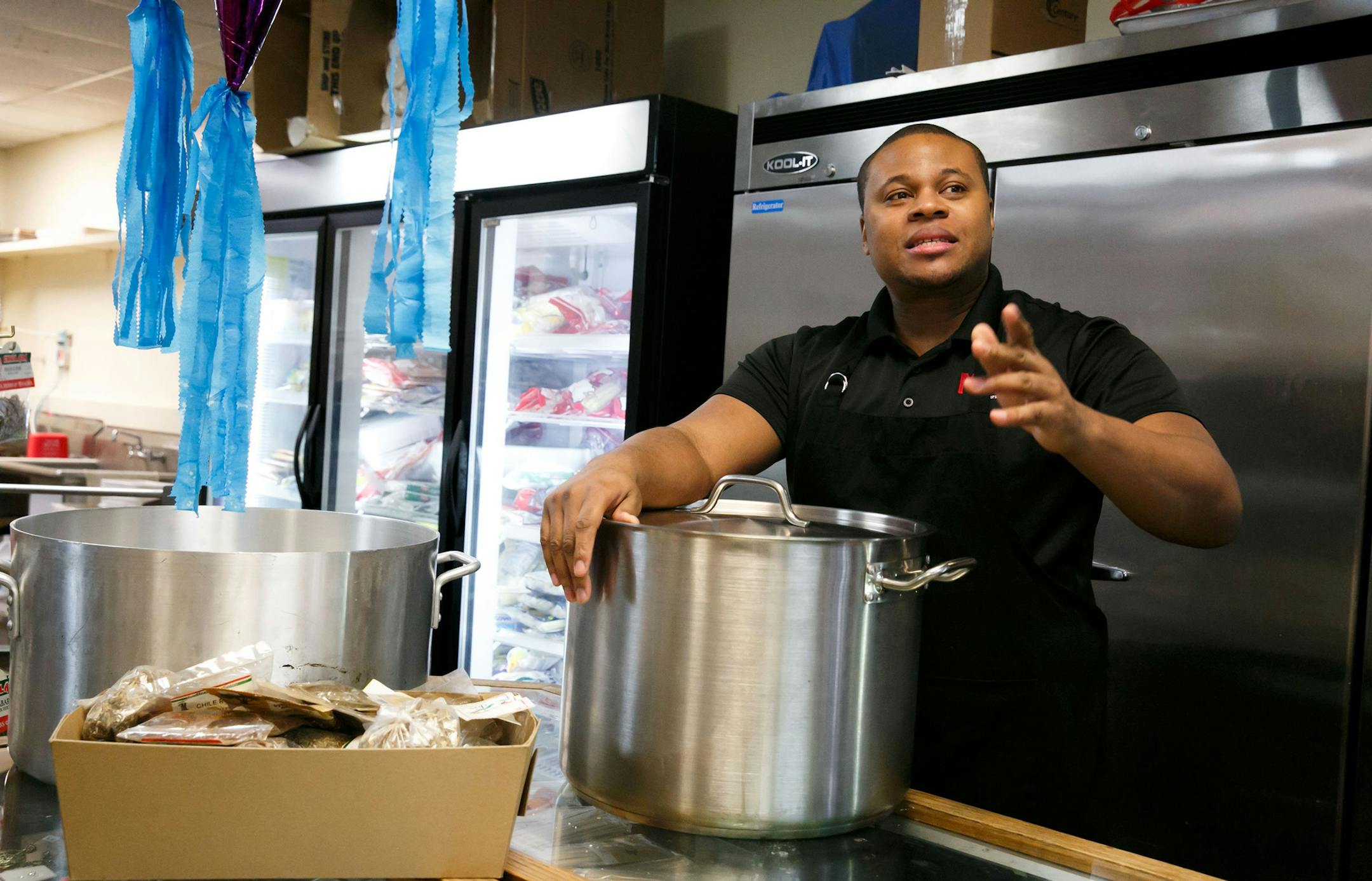 Spencer Lindsay, founder and creator of Mr. Maurs, talks about his business inside of a Peruvian store and restaurant in Shoreline, Wash. Lindsay creates his sauces inside the store and sells them on Amazon. (Erika Schultz/Seattle Times/TNS) ORG XMIT: 1198889