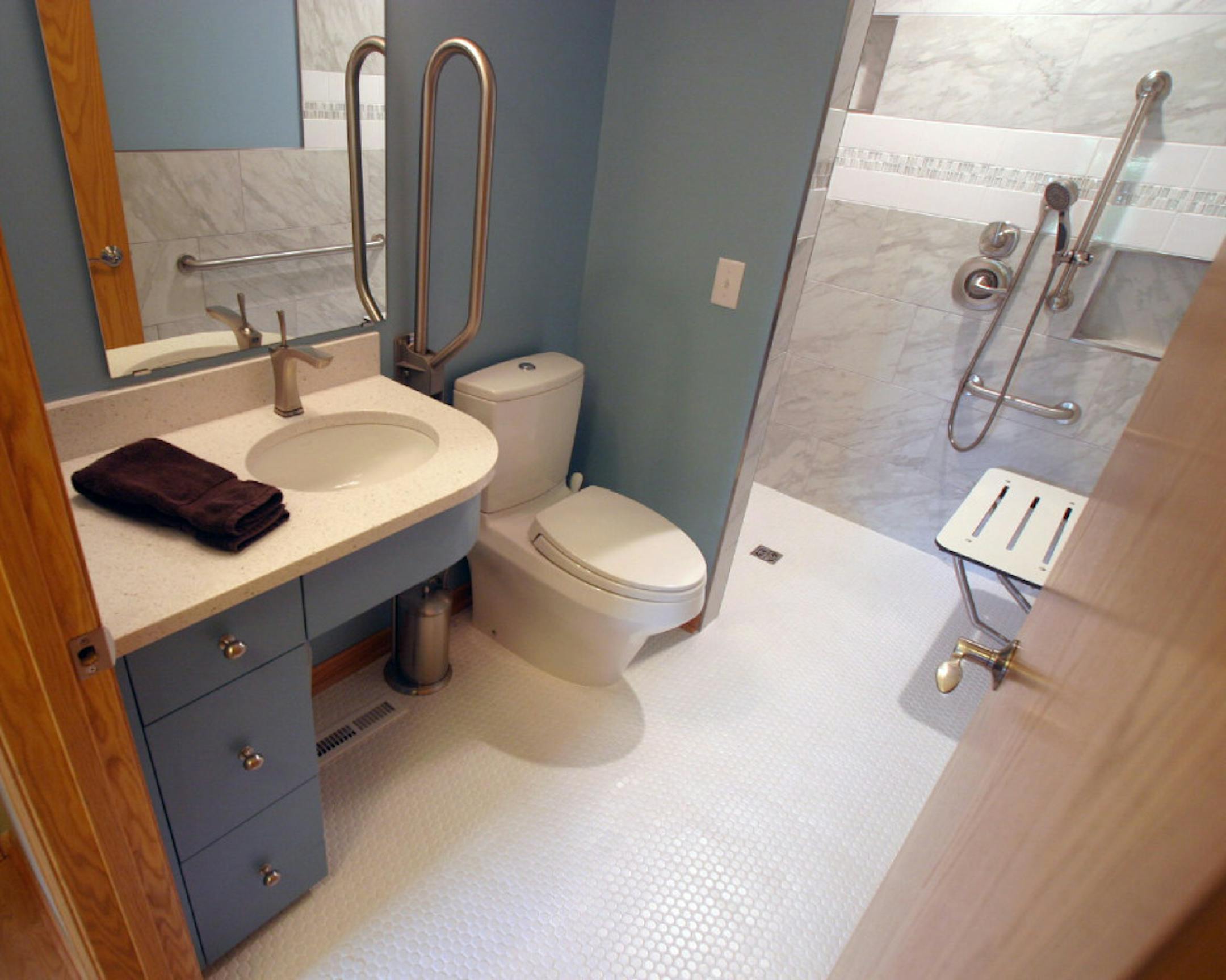 Accessible bathroom remodel by Talla Skogmo Interior Design.