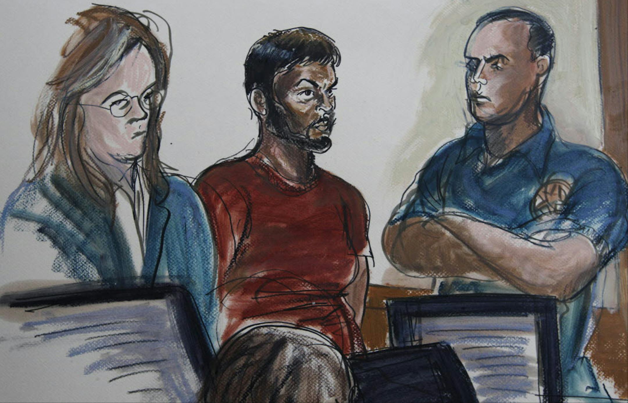 This courtroom sketch shows Quazi Mohammad Rezwanul Ahsan Nafis, 21, center, and his attorney Heidi Cesare, left, in Brooklyn Federal Court Wednesday.