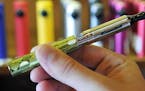 A new study found that vapers had 70 percent lower odds of quitting smoking than nonvapers. (Diedra Laird/Charlotte Observer/TNS)