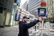 Brad Hardin, took a selfie in front of a 3-D sculpture of the Final Four bracket on the Nicollet Mall in Minneapolis. The crowd downtown will be large