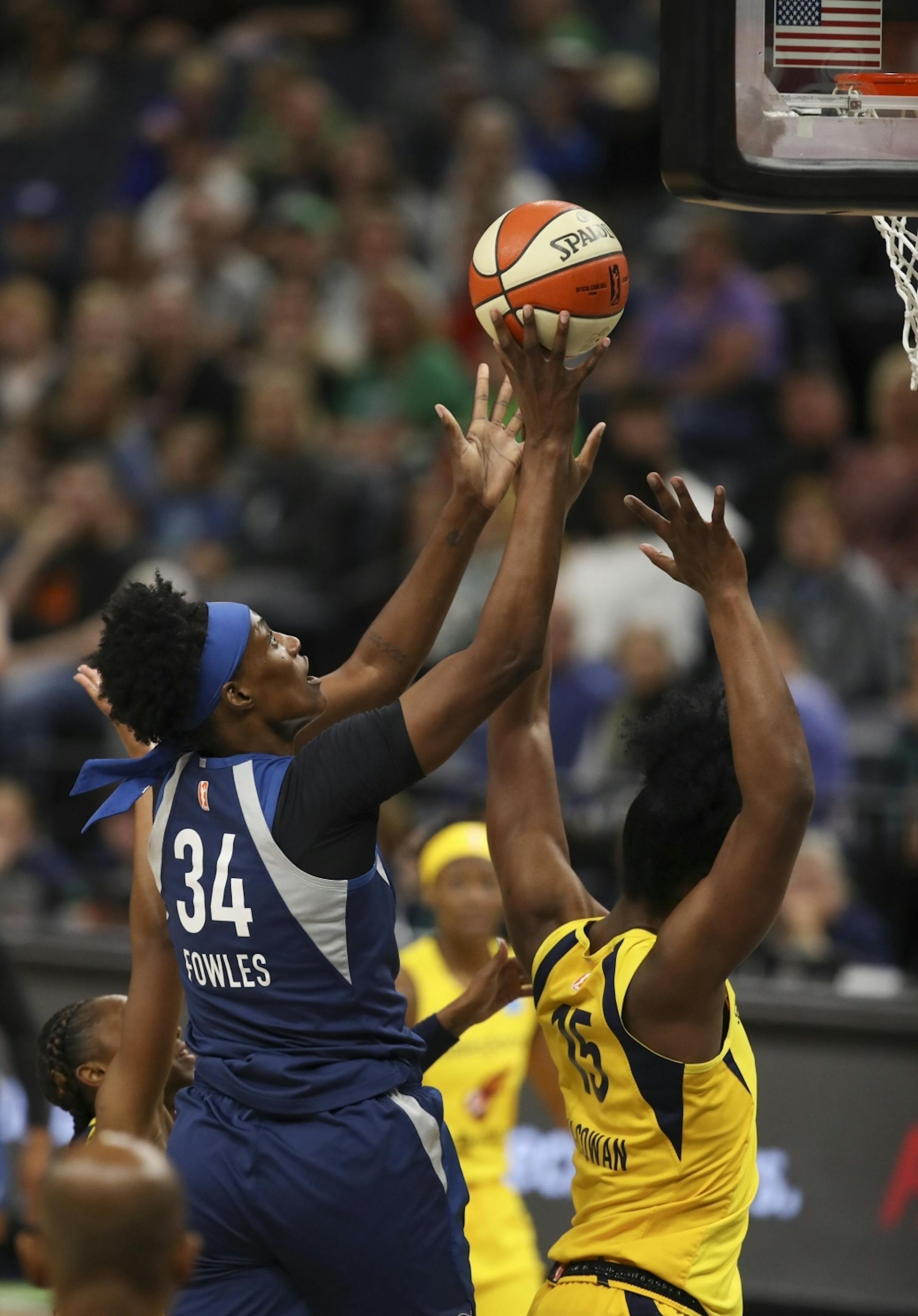 Minnesota Lynx center Sylvia Fowles (34) shot over the defense of Indiana Fever center Teaira McCowan (15) in the first quarter.