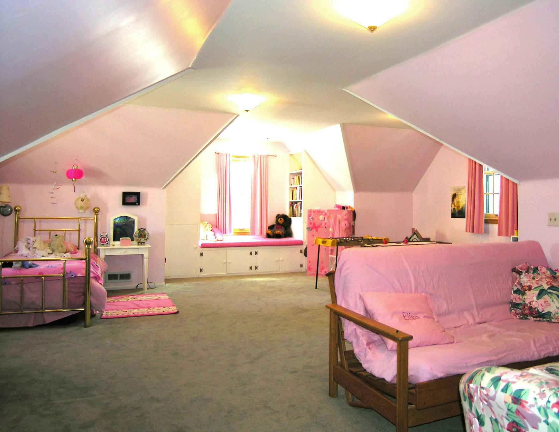 Before: Excess clutter and odd placement of furniture.