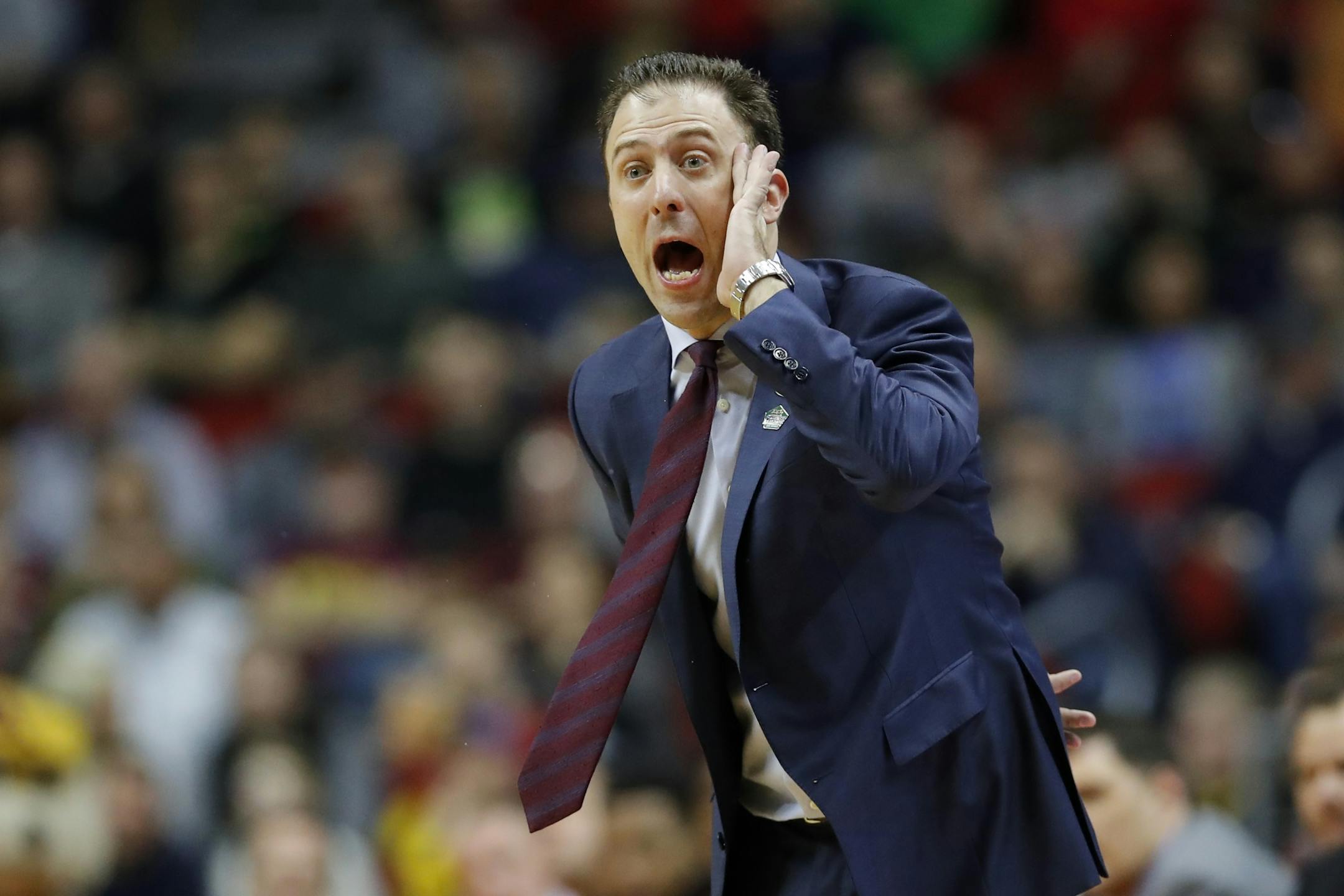 Gophers coach Richard Pitino directed his team during a first-round game against Louisville. Pitino signed an extension at season's end.