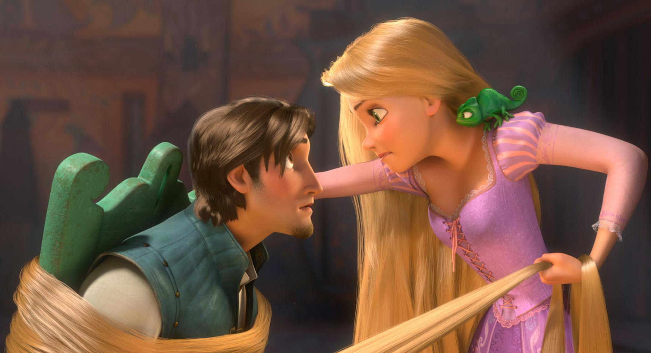 In this film publicity image released by Disney, Rapunzel, voiced by Mandy Moore, right, and Flynn, voiced by Zachary Levi are shown in a scene from the animated feature, "Tangled." (AP Photo/Disney Enterprises, Inc.)