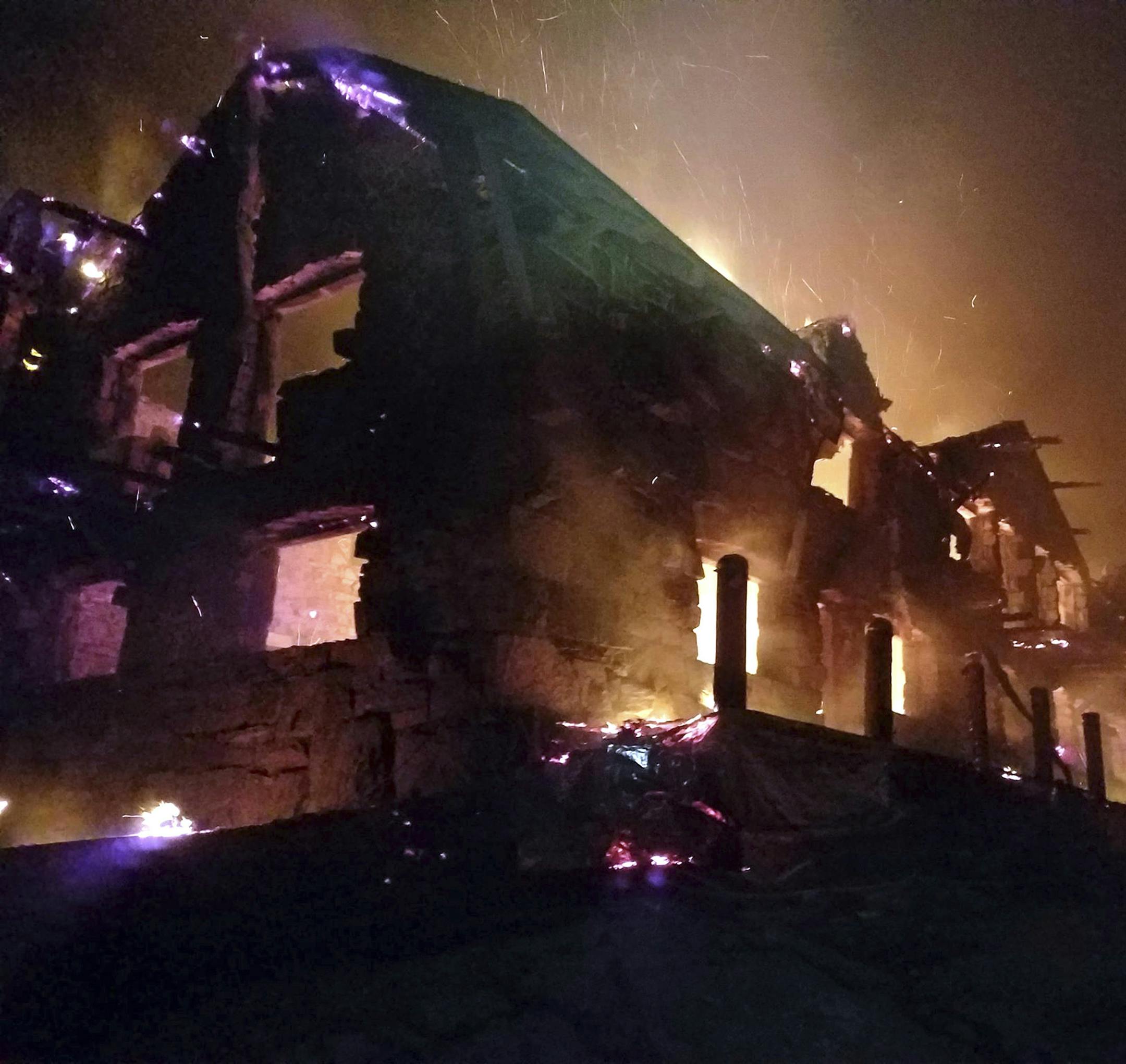 The historic main Sperry Chalet building was engulfed in flames in Montana's Glacier National Park.