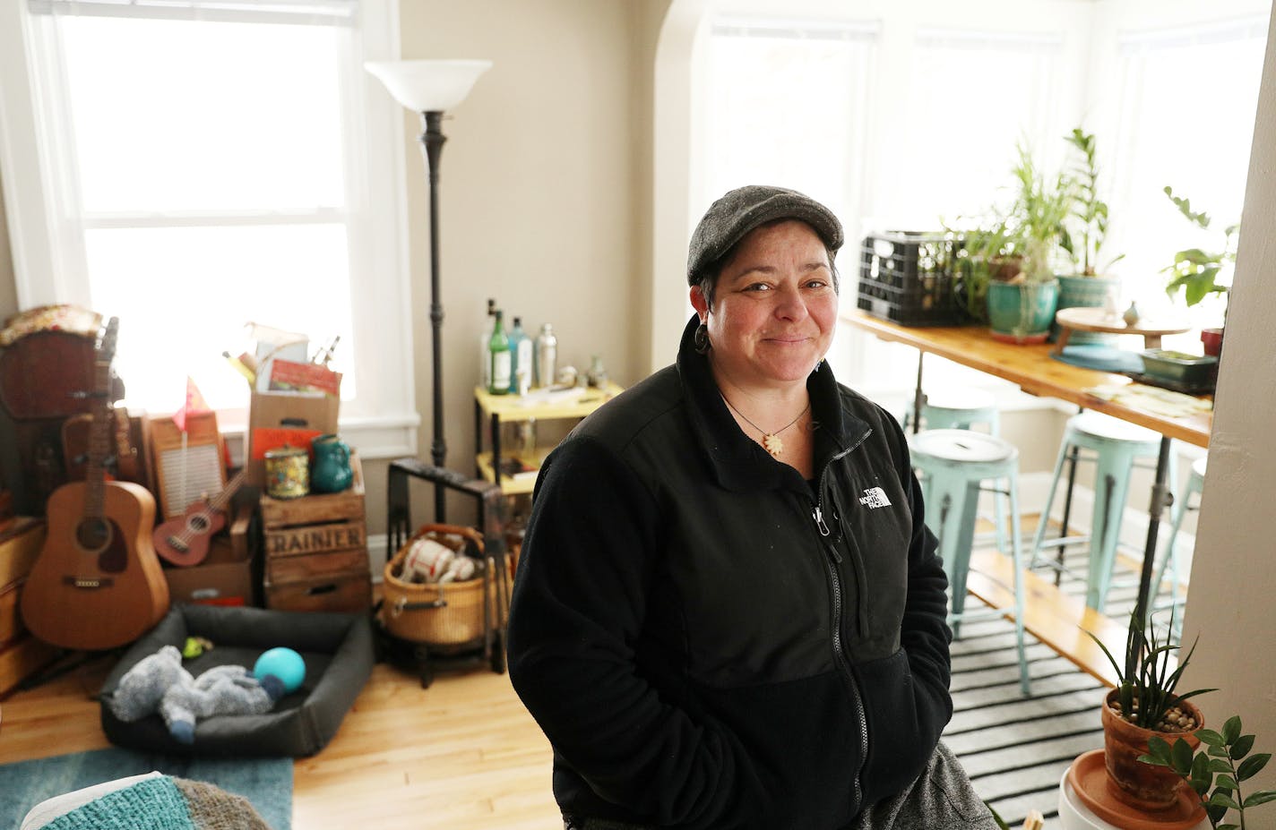 Marni Zimlin, who moved into her first house this weekend after getting outbid on two previous houses, sat for a portrait at her new house in the McKinley neighborhood.