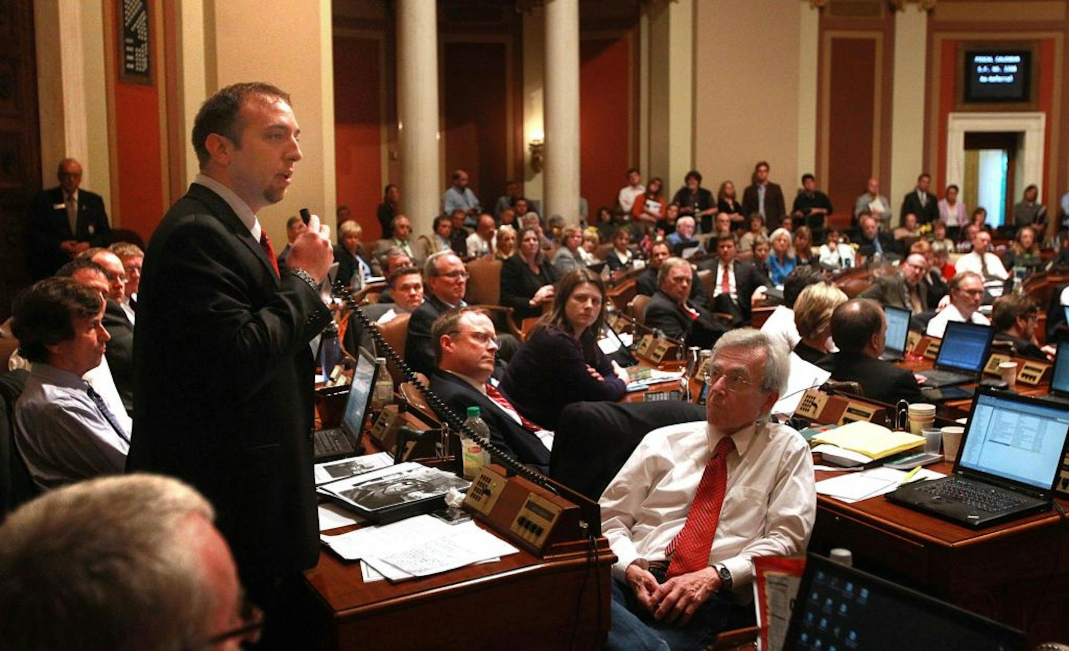 Rep. John Kriesel speaks to House members.