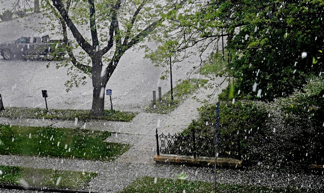 Hail falls in St. Paul during a storm in May 2022.