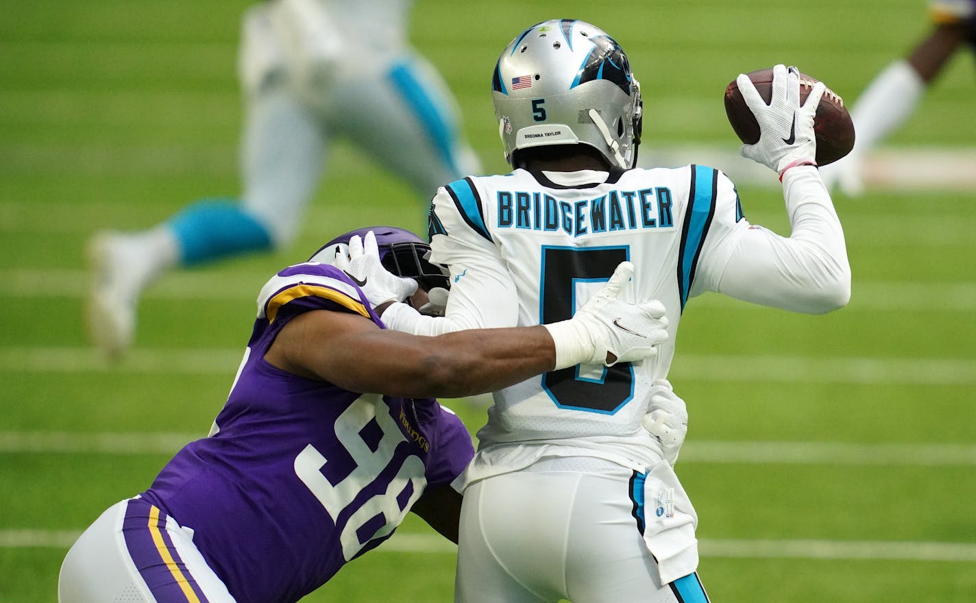 Minnesota Vikings defensive end D.J. Wonnum (98) sacked Carolina Panthers quarterback Teddy Bridgewater (5) in the first quarter. ] ANTHONY SOUFFLE • anthony.souffle@startribune.com