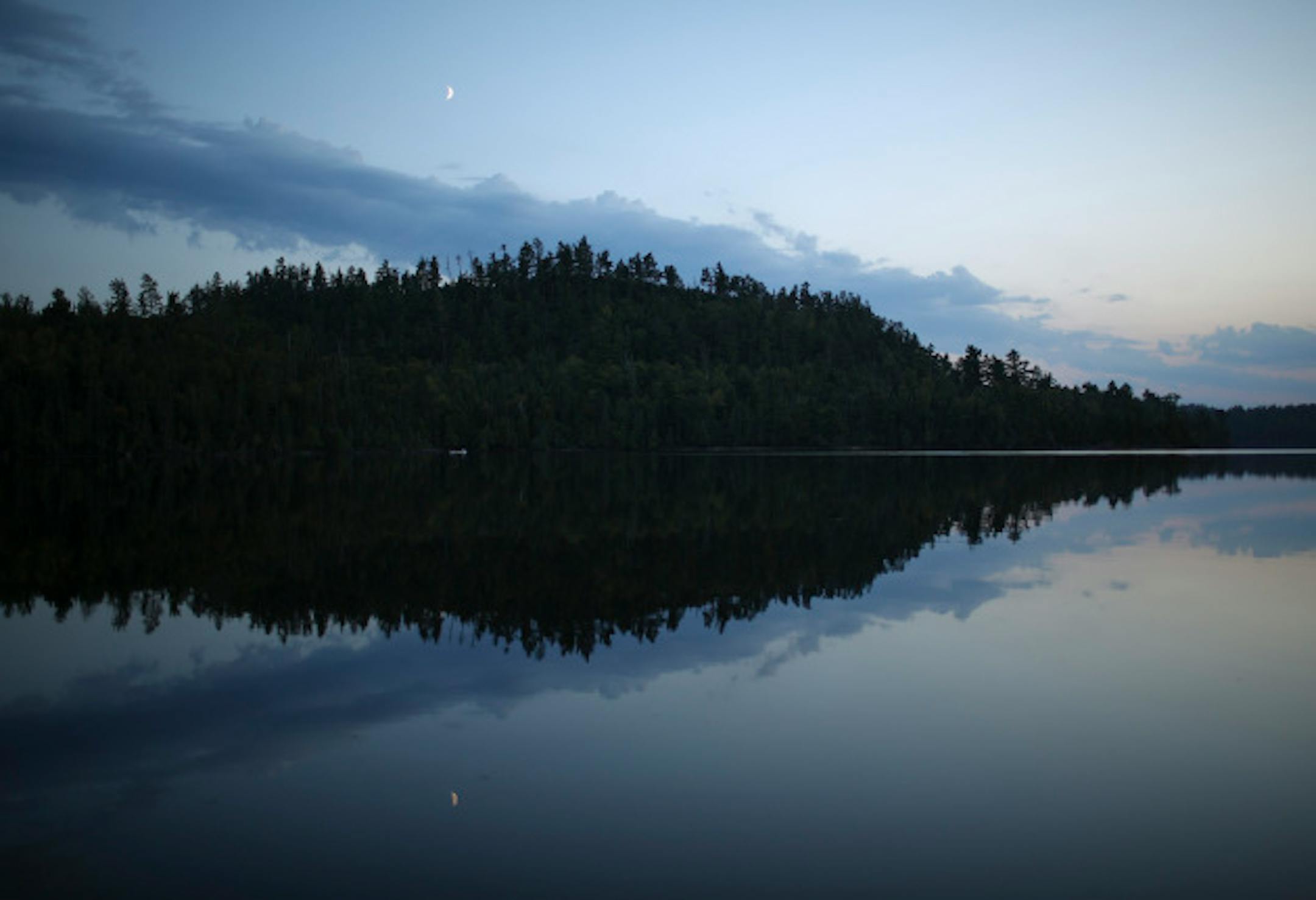 A canoe at twilight on Moss Lake at the edge of the Boundary Waters Canoe Area in August of 2012.     ]  JEFF WHEELER • jeff.wheeler@startribune.com