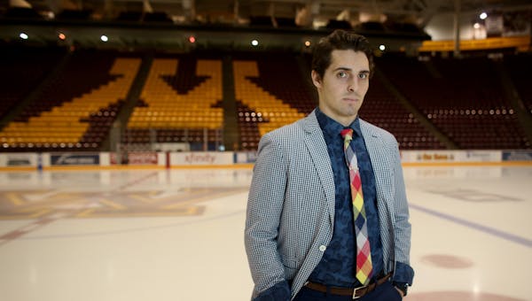 Gopher forward Vinni Lettieri stood on the ice in what he might wear after a game. ] (KYNDELL HARKNESS/STAR TRIBUNE) kyndell.harkness@startribune.com 