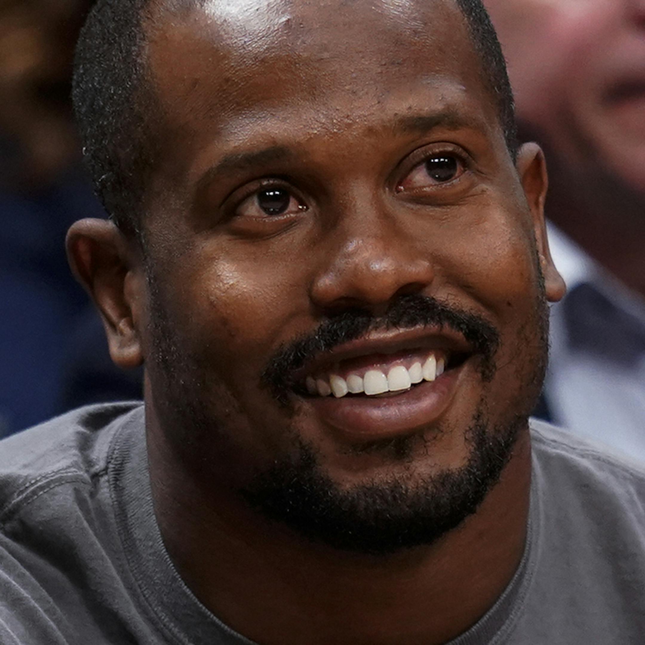 Denver Broncos linebacker Von Miller, front right, smiles during the first quarter of an NBA basketball game between the Denver Nuggets and the Phoenix Suns, Friday, Oct. 25, 2019, in Denver. (AP Photo/Jack Dempsey)