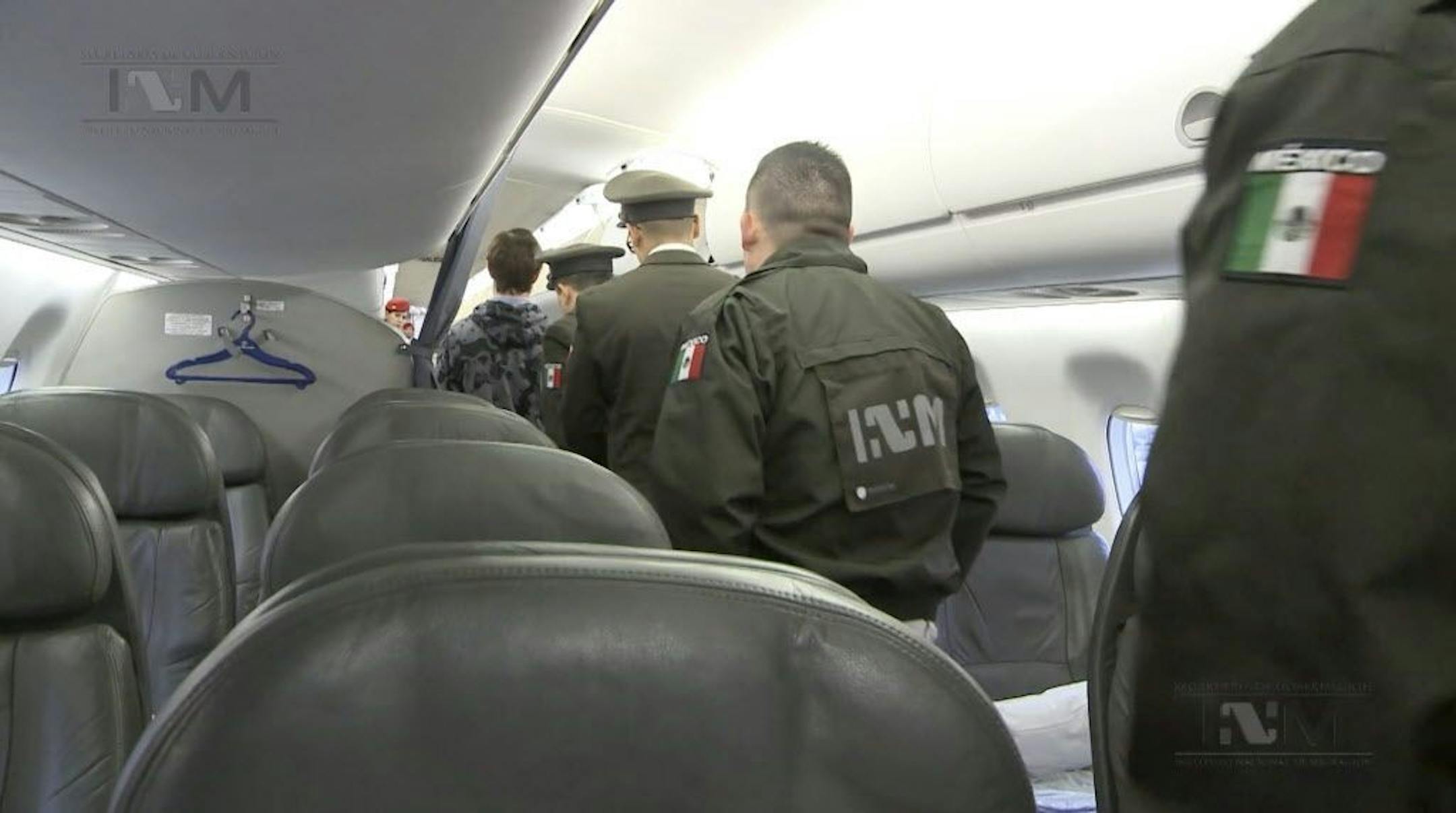 This frame grab taken from a Thursday, Jan. 28, 2016 video provided by Mexico's Instituto Nacional de Migracion, INM, shows Ethan Couch, escorted onto a plane by Mexican immigration agents, in Mexico City. INM says it has taken the Texas teenager who used an "affluenza" defense in a fatal drunken-driving accident to the Mexico City airport, to fly him back to Texas to face charges. Couch was placed on a commercial flight to Dallas, Texas.