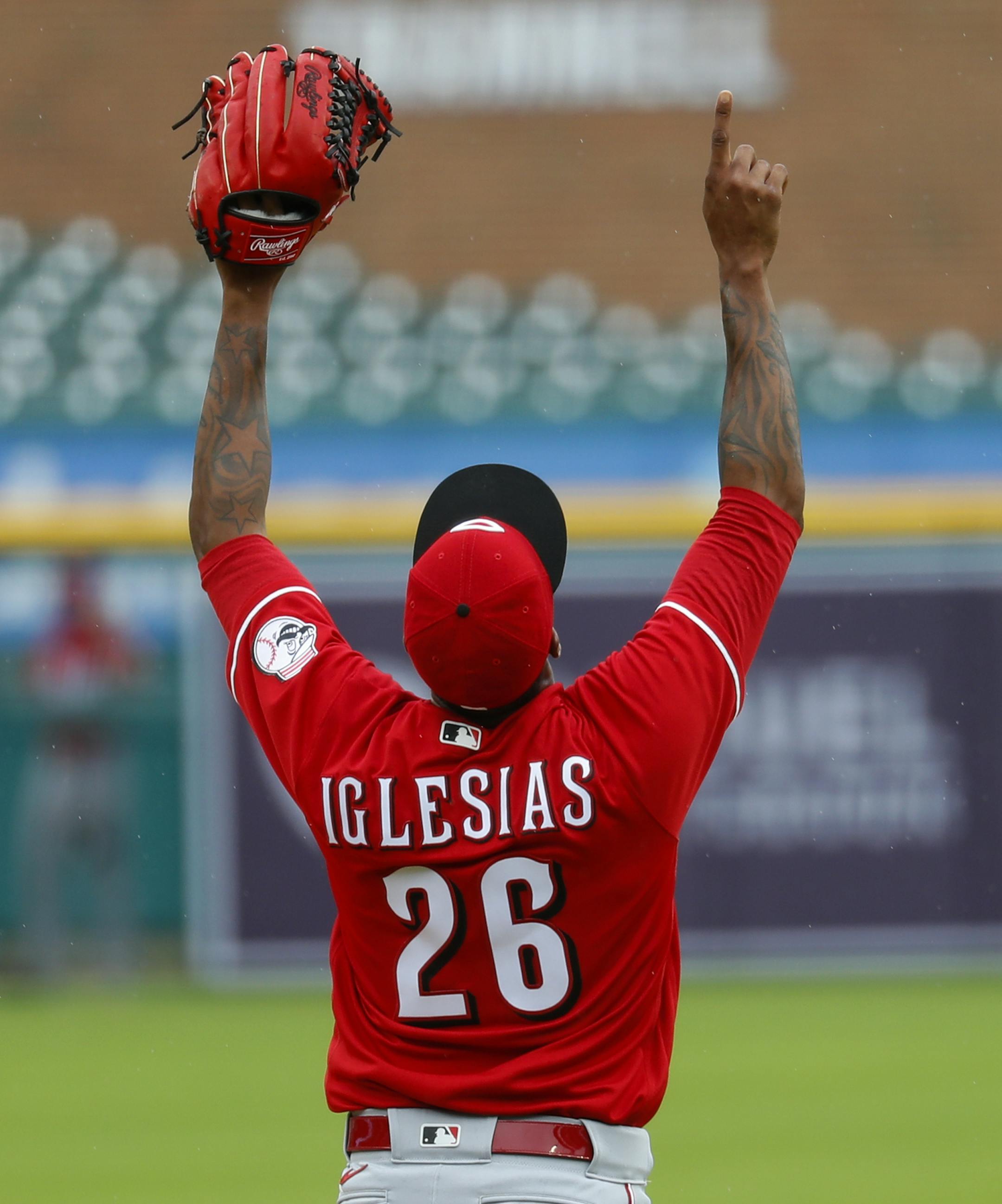 Cincinnati Reds relief pitcher Raisel Iglesias celebrates the final out against the Detroit Tigers in the seventh inning of the first baseball game of a doubleheader in Detroit, Sunday, Aug. 2, 2020. (AP Photo/Paul Sancya)