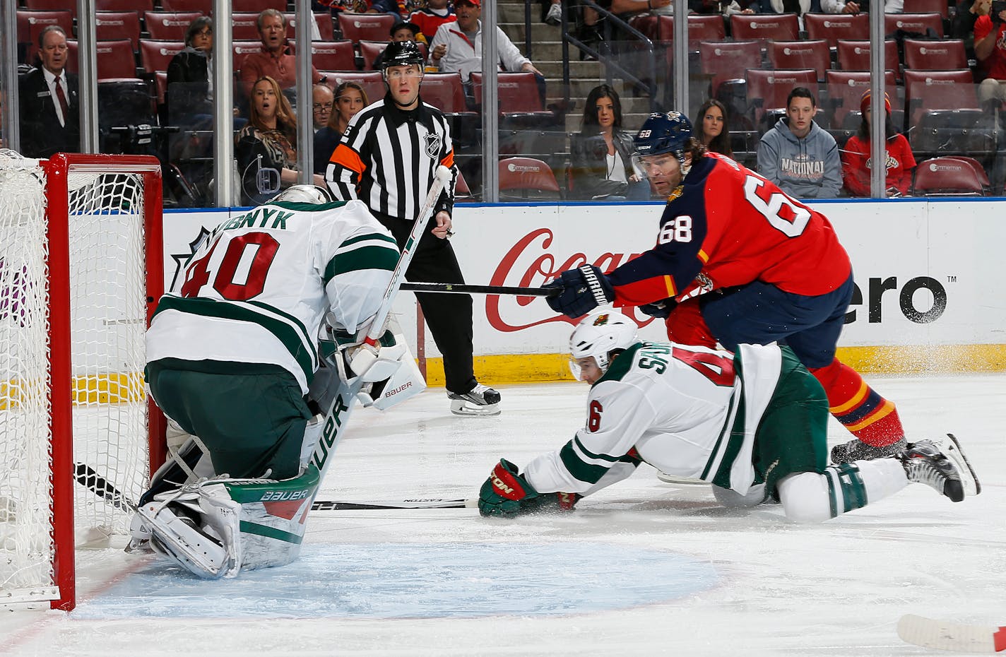 Florida Panthers forward Jaromir Jagr (68) scores a goal past Minnesota Wild�s goaltender Devan Dubnyk (40) during the first period of an NHL hockey game, Sunday, Jan. 3, 2016, in Sunrise, Fla. (AP Photo/Joel Auerbach)