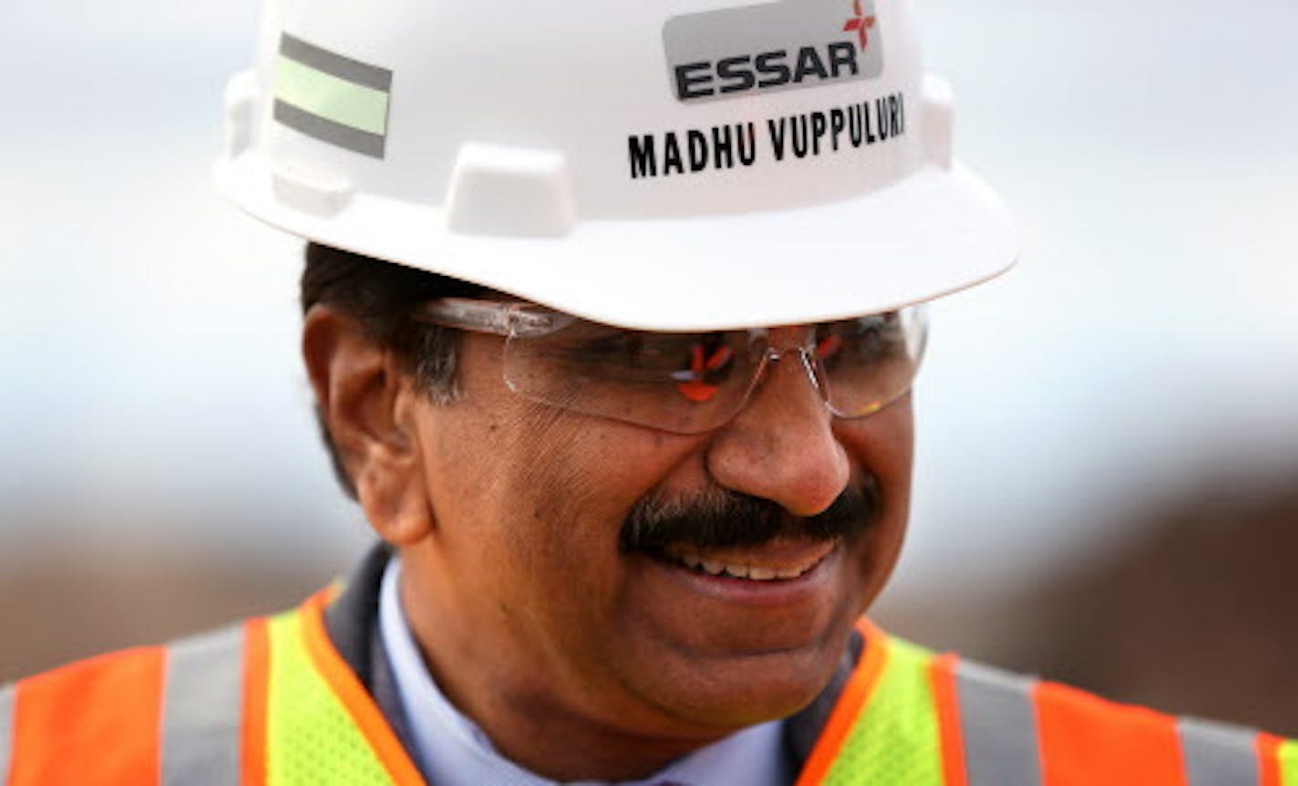 Madhu Vuppuluri, president and CEO of Essar Steel Minnesota, looks over the Essar Project in Nashwauk, Minn. Essar Steel Minnesota recently ramped up construction on an $1.8 billion taconite plant after securing the funding needed to complete the project. ] LEILA NAVIDI leila.navidi@startribune.com / BACKGROUND INFORMATION: Thursday, October 30, 2014. The plant endured several delays over the past two years as funds periodically ran dry and some contractors were paid late and walked off the job.