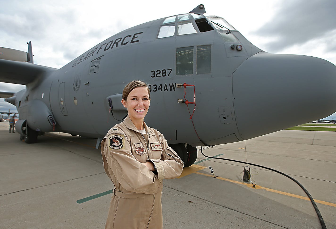 Lt. Alicia Makoutz posed at the 934th Airlift Wing next to one of the C-130 cargo planes she will fly as part of a 120-day deployment, which will likely include missions in Afghanistan and Iraq. Makoutz said becoming a pilot has always been her dream job.