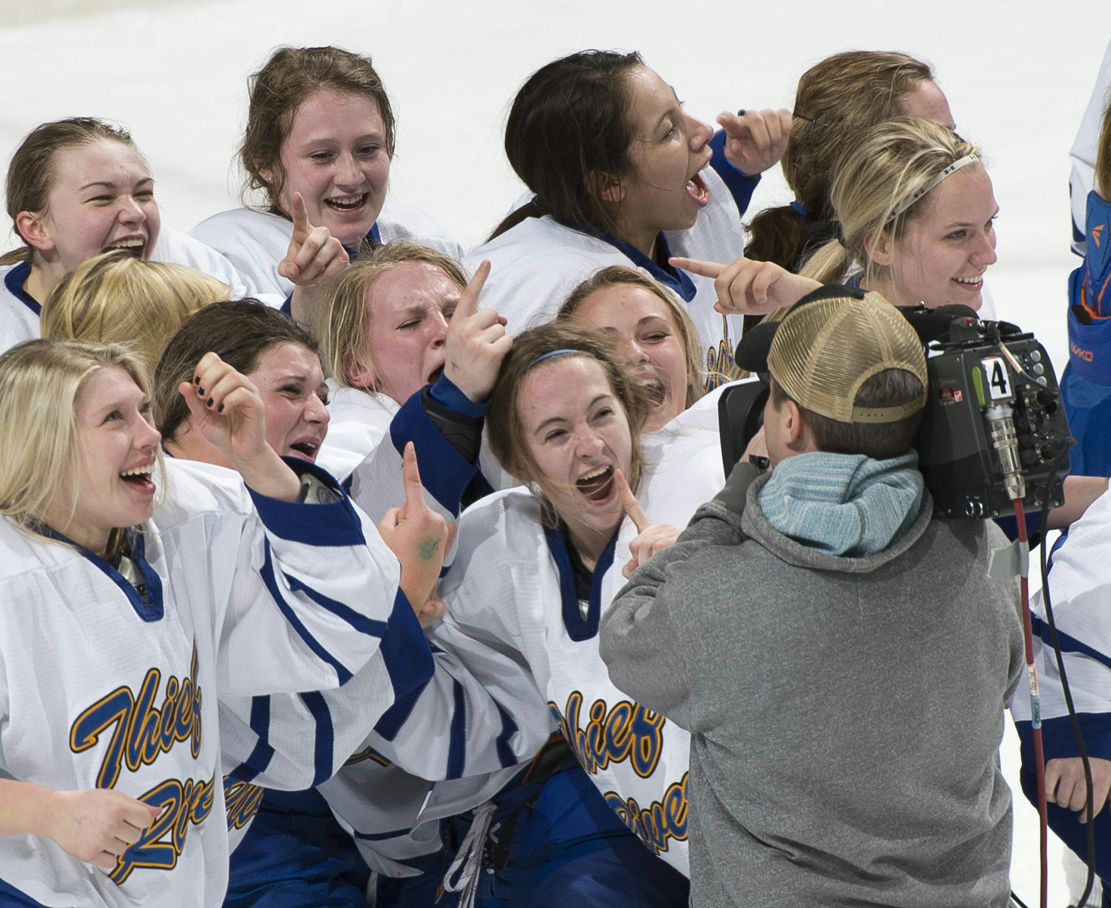 Thief River Falls celebrates their 3-1 victory over The Blake School to win the 1A Girls' Championship on Saturday. ] (Aaron Lavinsky | StarTribune) The Blake School plays Thief River Falls in the 1A Girls' Hockey Championship game on Saturday, Feb. 21, 2015 at Xcel Energy Center in St. Paul.