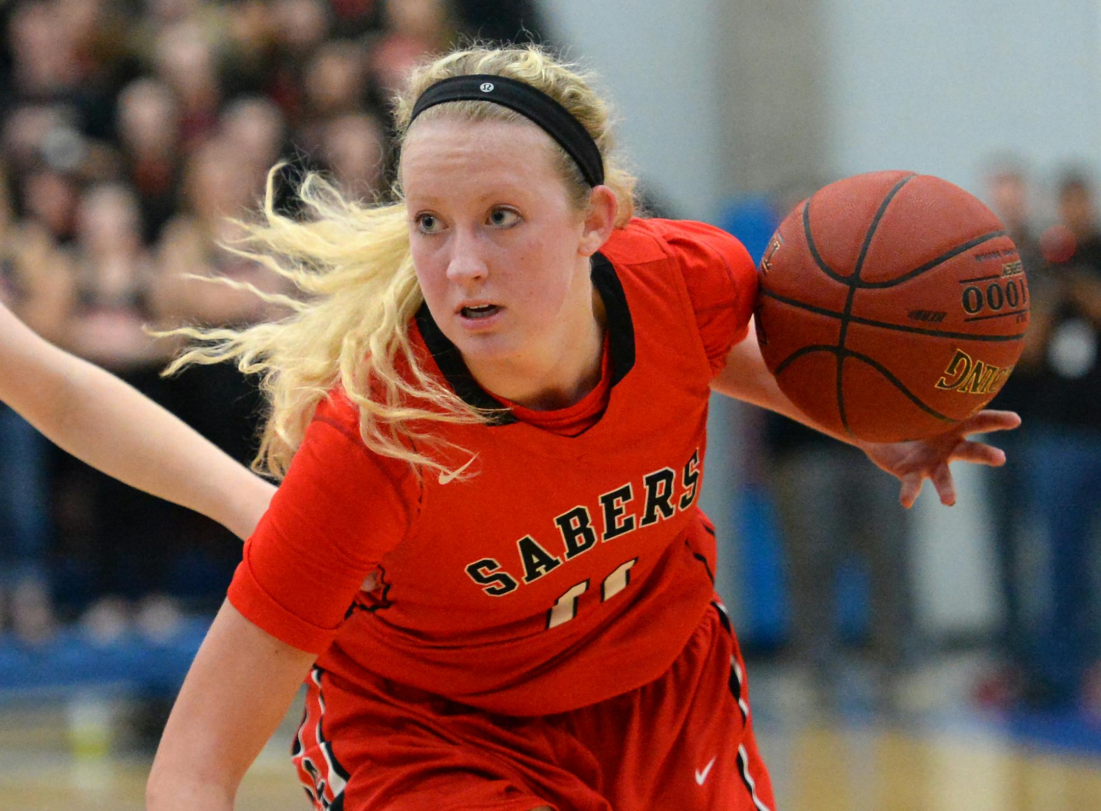Shakopee guard Taylor Koenen (11) controlled the ball against Minnetonka Friday. ] (AARON LAVINSKY/STAR TRIBUNE) aaron.lavinsky@startribune.com Minnetonka played Shakopee in the Class 4A, Section 2 girls' basketball final on Friday, March 11, 2016 at Hopkins High School in Minnetonka, Minn.