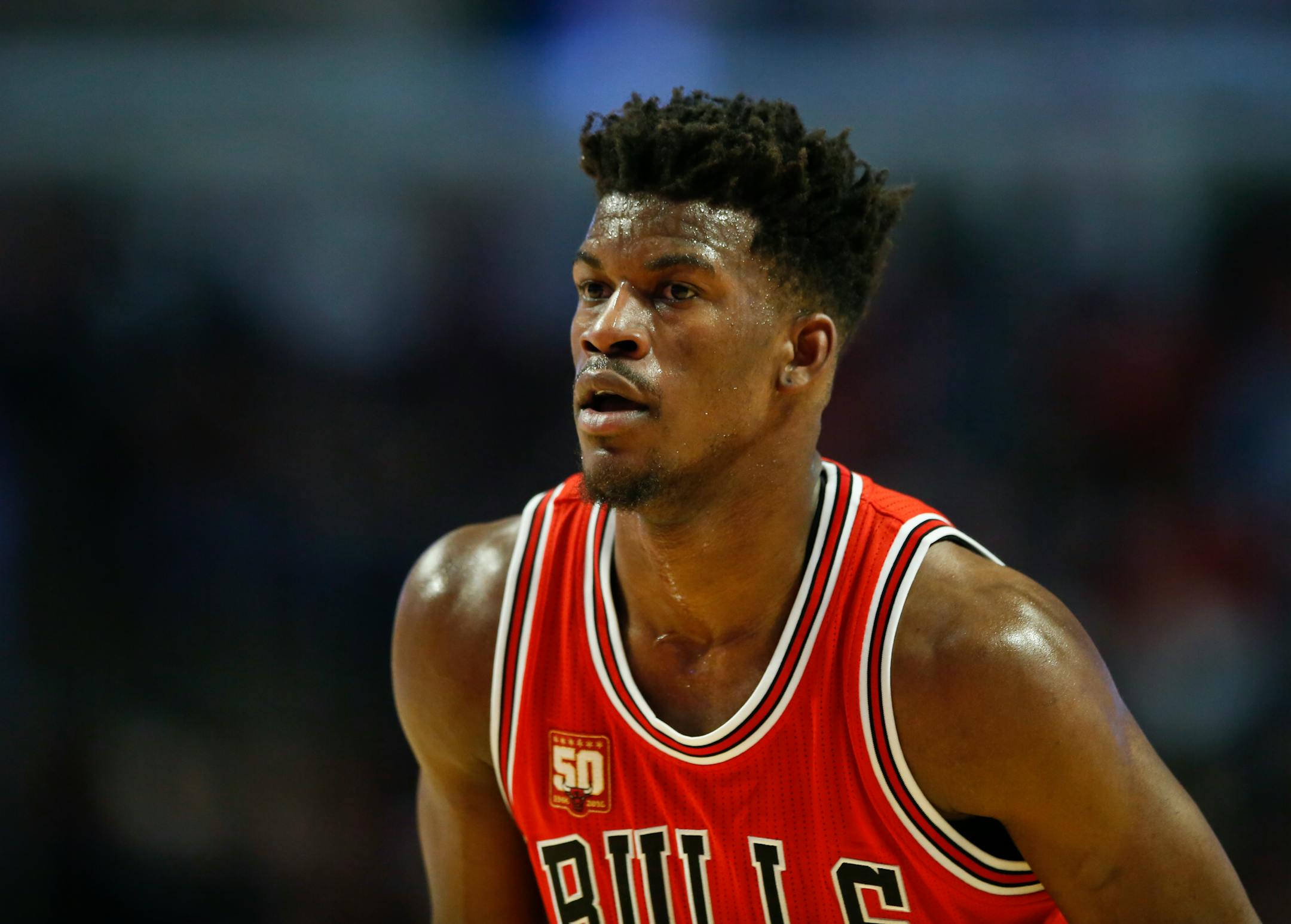 Chicago Bulls guard Jimmy Butler looks on against the Philadelphia 76ers during the first half of an NBA basketball game, Wednesday, April 13, 2016 in Chicago. (AP Photo/Kamil Krzaczynski) ORG XMIT: CXA128
