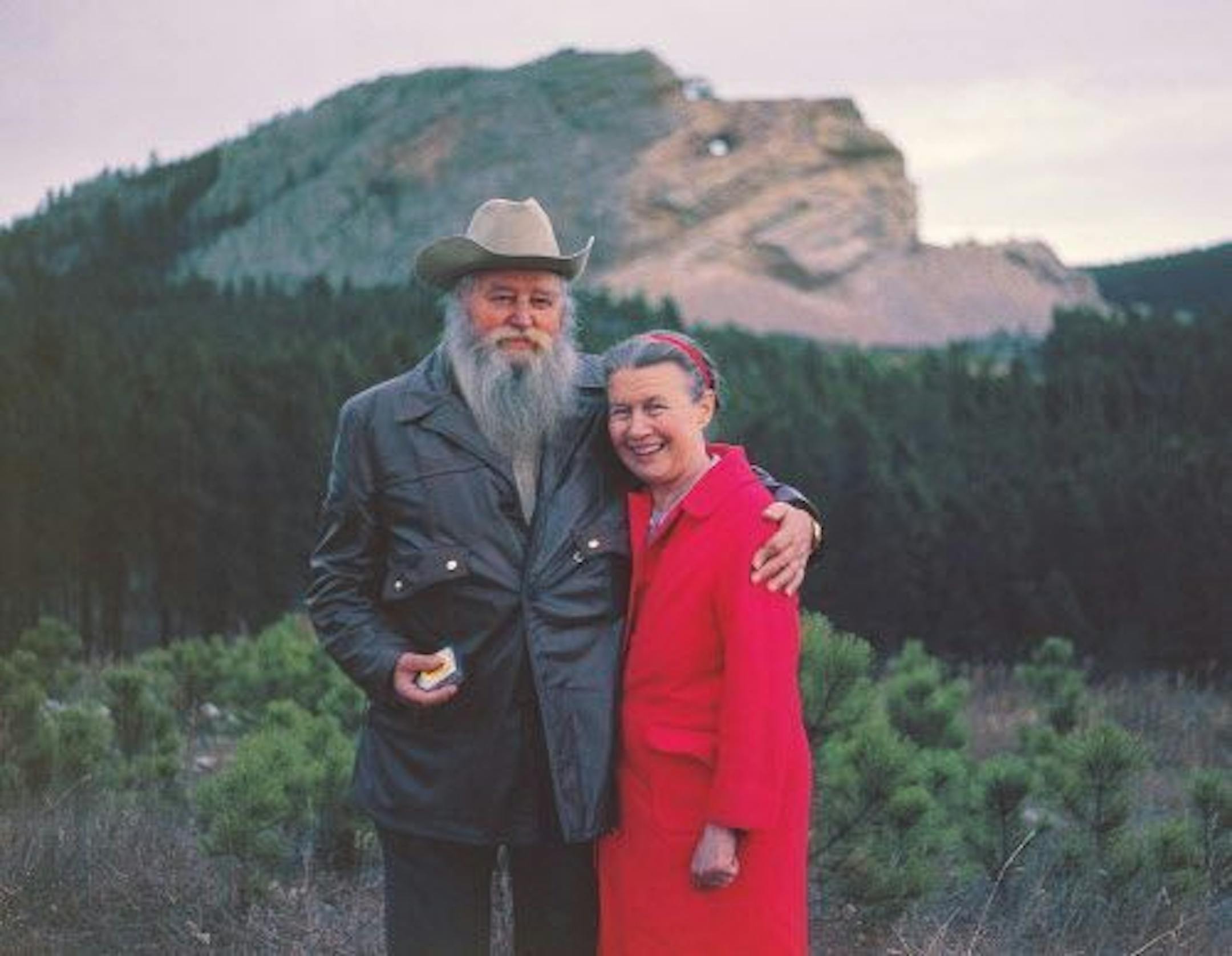 This 1982 photo provided by the Crazy Horse Memorial Foundation shows Ruth Ziolkowski and her husband Korczak Ziolkowski, before the Crazy Horse Memorial mountain carving in Custer, S.D.