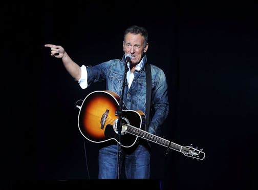 FILE - In this Nov. 5, 2018 file photo, Bruce Springsteen performs at the 12th annual Stand Up For Heroes benefit concert at the Hulu Theater at Madison Square Garden in New York. Springsteen surprised moviegoers by introducing his new concert film in his New Jersey hometown. The Asbury Park Press reports Springsteen introduced two showings of "Western Stars" at the AMC Loews Freehold Metroplex Cinema in Freehold on Saturday, Oct. 19, 2019.