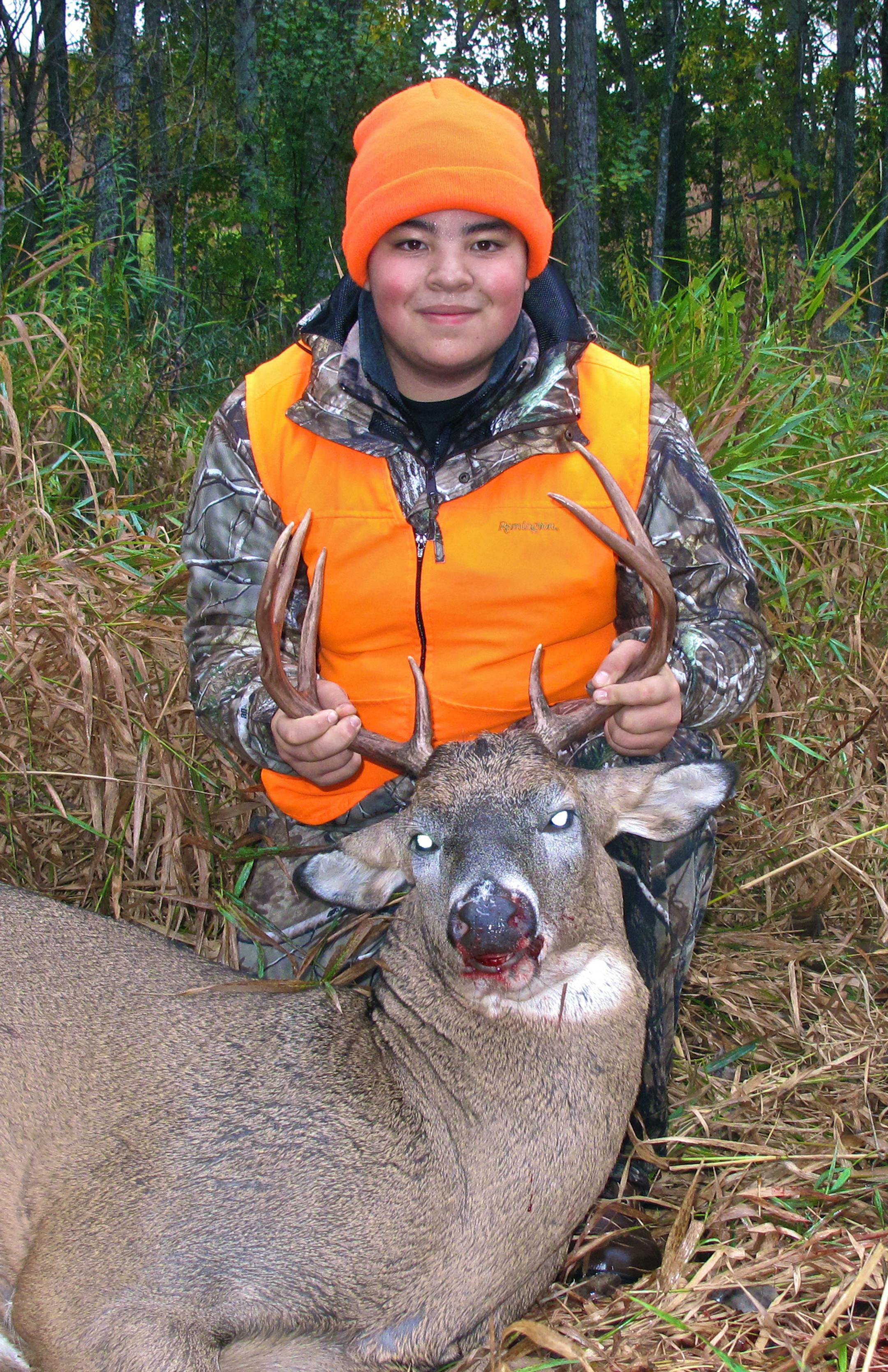 Andrew Ching, 14, of Eagan, with his first deer.