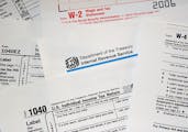 (FILES) This 24 March, 2006 photo shows US Internal Revenue Service (IRS) tax forms. More than 14,700 Americans with previously undisclosed offshore b