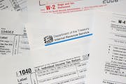 (FILES) This 24 March, 2006 photo shows US Internal Revenue Service (IRS) tax forms. More than 14,700 Americans with previously undisclosed offshore b