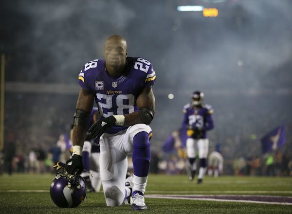 Vikings running back Adrian Peterson paused after he took the field before a cold game against the New York Giants in late December.