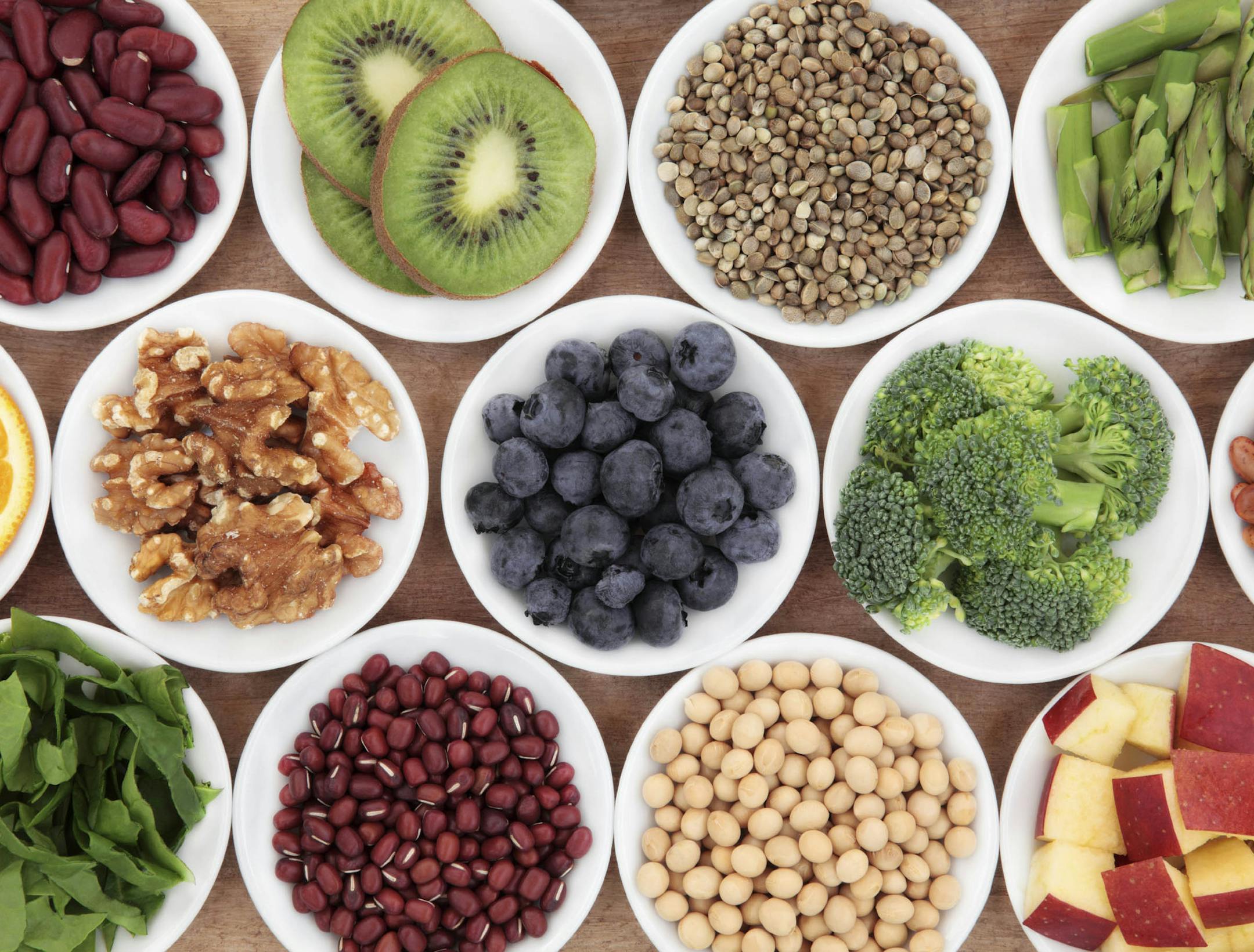 Superfood health food selection in white bowls.