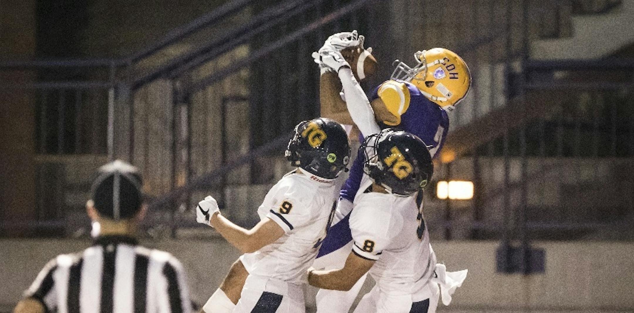 Cretin-Derham Hall wide receiver Peter Udoibok (shown catching a touchdown pass against Totino-Grace last year), a three-star recruit who'll be a senior this fall, announced via Twitter on Monday that he has committed to the Gophers.