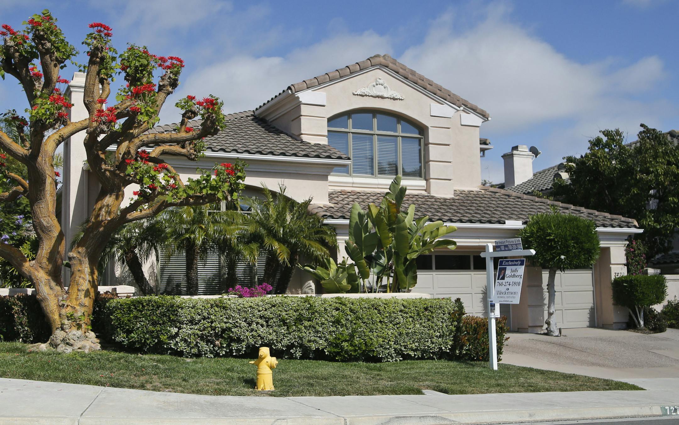 This Thursday, May 26, 2016, photo shows a home for sale in Carlsbad, Calif. On Thursday, Aug. 4, Freddie Mac reports on the week's average U.S. mortgage rates. (AP Photo/Lenny Ignelzi) ORG XMIT: NYBZ408