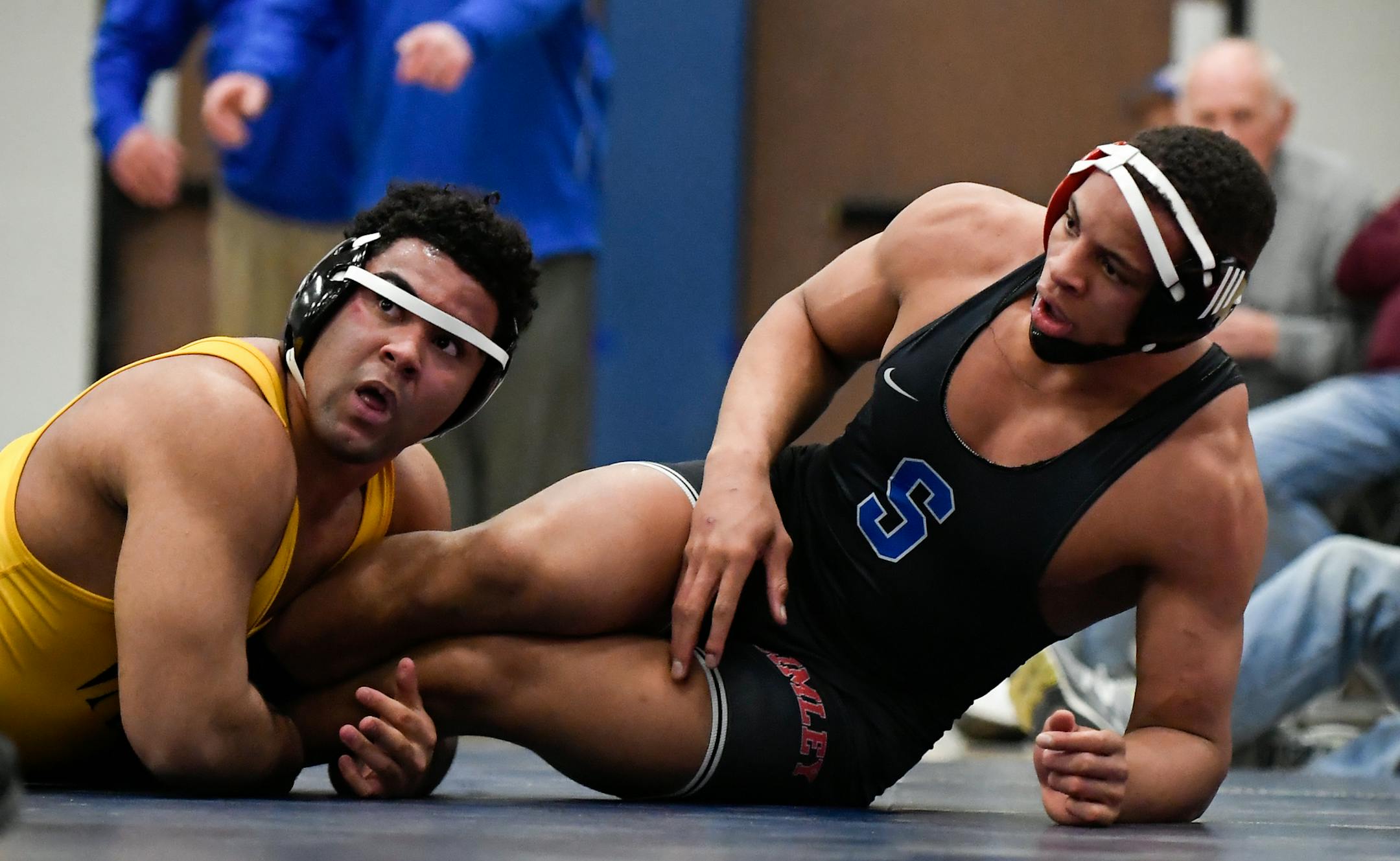 Apple Valley's Gable Steveson looked to the official for two points after taking down Simley's Daniel Kerkvliet, but the official ruled the take down out of bounds. ] AARON LAVINSKY ï aaron.lavinsky@startribune.com Apple Valley's Gable Steveson wrestled against Simley's Daniel Kerkvliet in a heavyweight match on Friday, Feb. 2, 2018 at Simley High School in Inver Grove Heights, Minn.