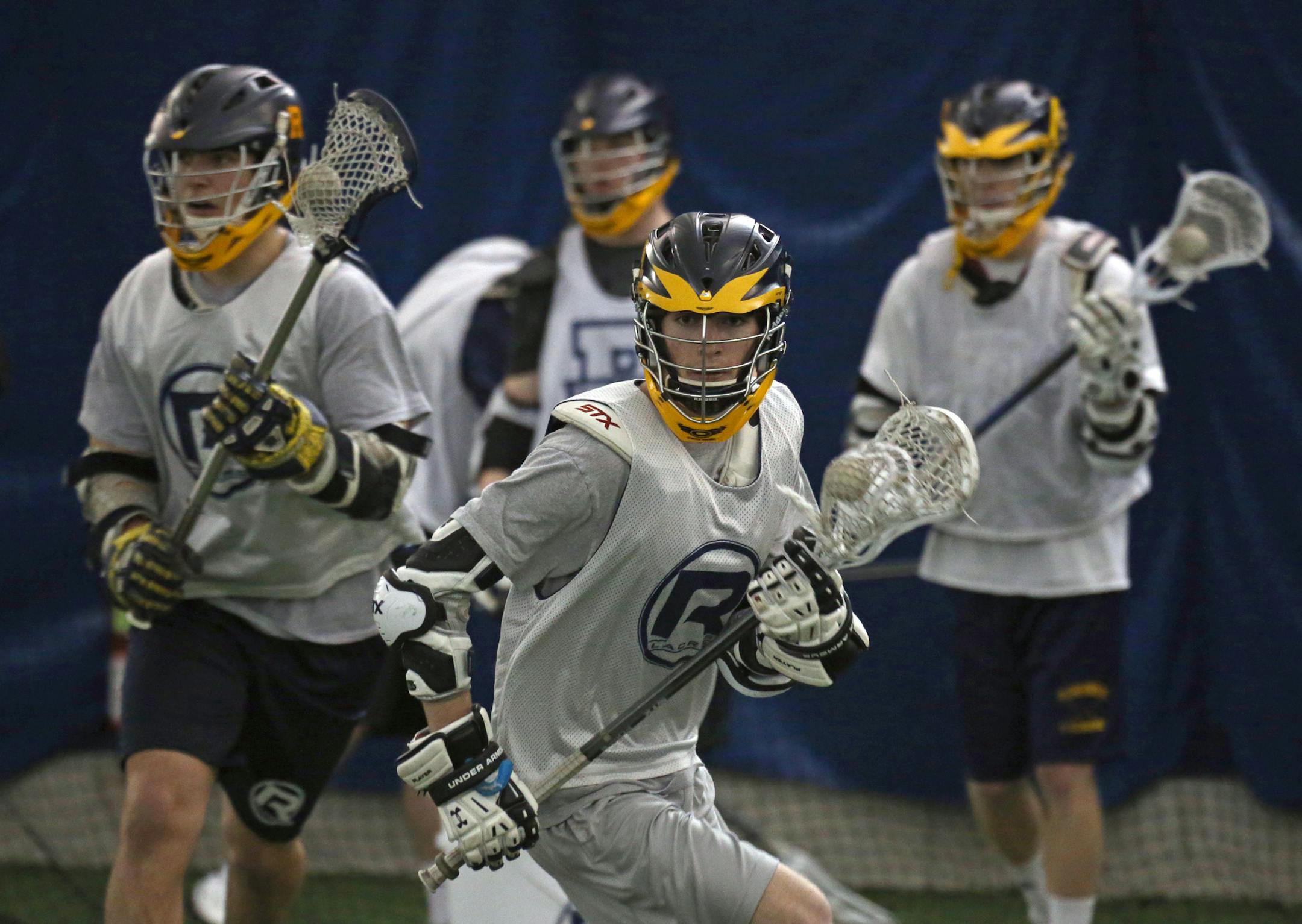 (center) Conner Yepsen and the Rosemount High School boys lacrosse team ran drills during indoor practice at the Irish Sports Dome on 4/11/13. Bruce Bisping/Star Tribune bbisping@startribune.com Conner Yepsen/source
