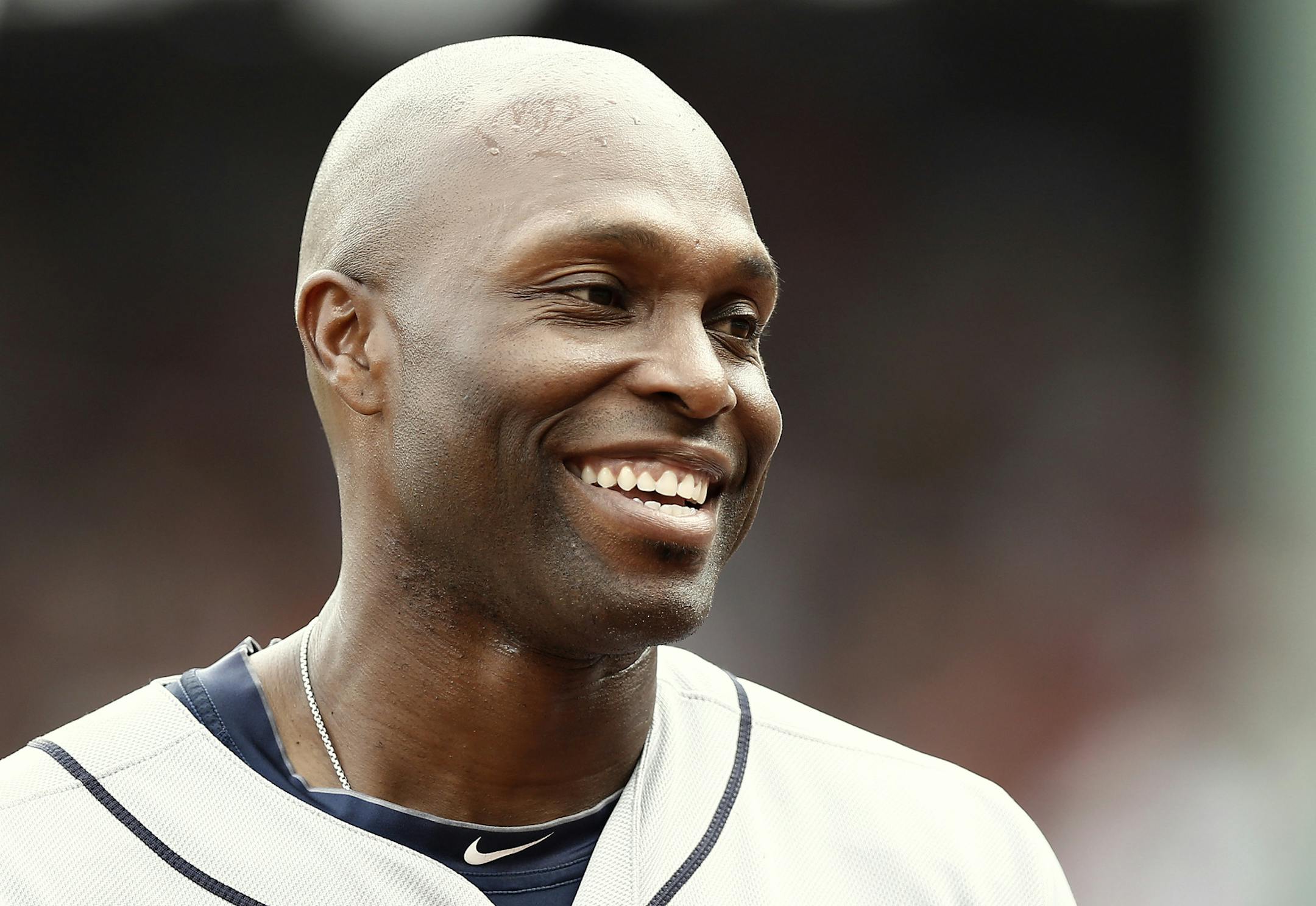 Detroit Tigers' Torii Hunter laughs at teammates during the eighth inning of a baseball game against the Boston Red Sox at Fenway Park in Boston Monday, Sept. 2, 2013. (AP Photo/Winslow Townson) ORG XMIT: NYOTK