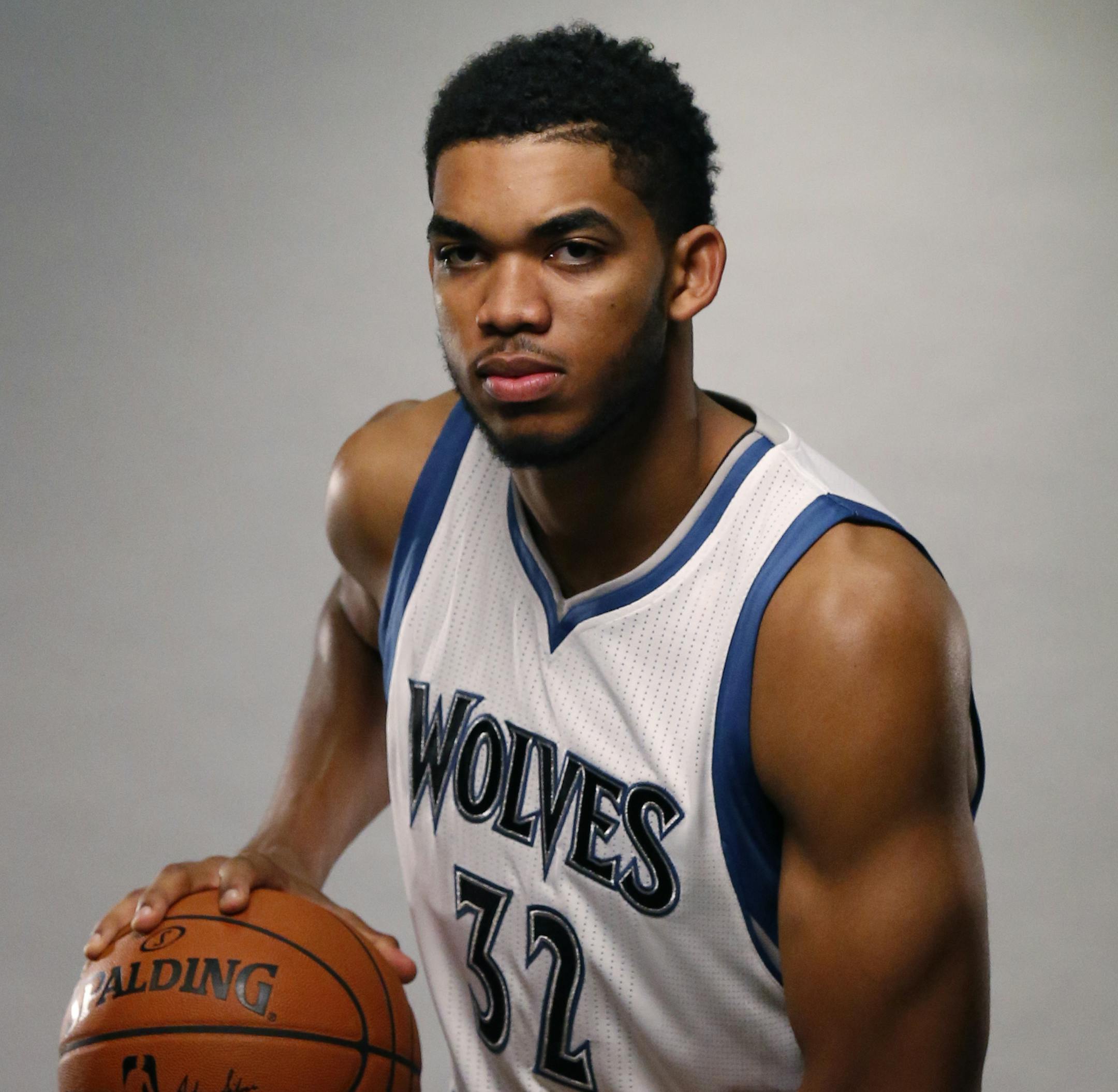 Minnesota Timberwolves center Karl-Anthony Towns (32) poses during Timberwolves NBA media day in Minneapolis, Monday, Sept. 28, 2015. (AP Photo/Ann Heisenfelt) ORG XMIT: OTKAH103