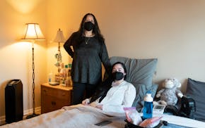 Paris Dolfman, right, with her mother, Alicia Martinez, at their home in Roswell, Ga., on March 12, 2024.